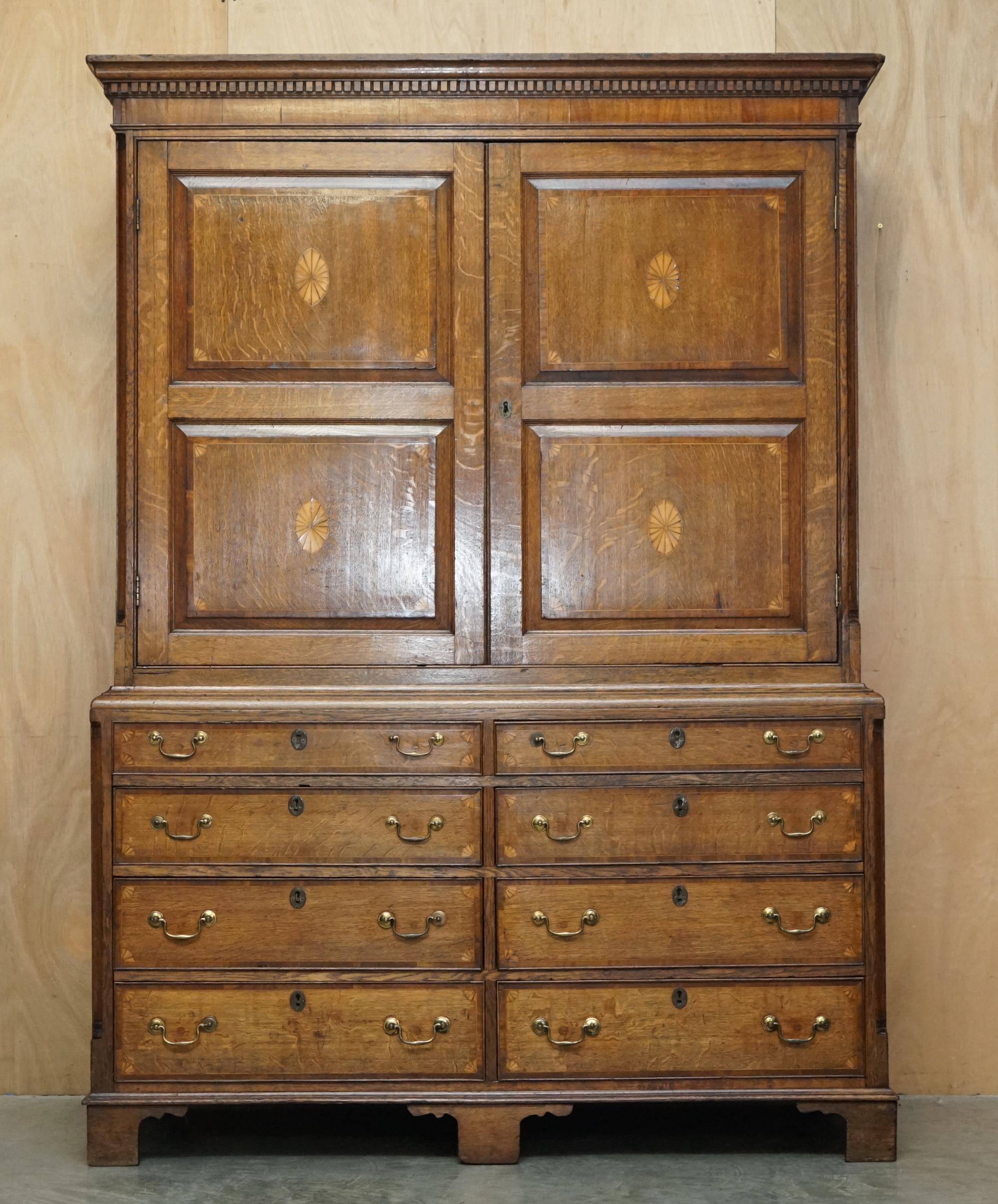 Royal House Antiques

Royal House Antiques is delighted to offer for sale this absolutely exquisite hand made in England circa 1800 Sheraton Housekeepers cupboard Armoire which bank of drawers to the base

Please note the delivery fee listed is just