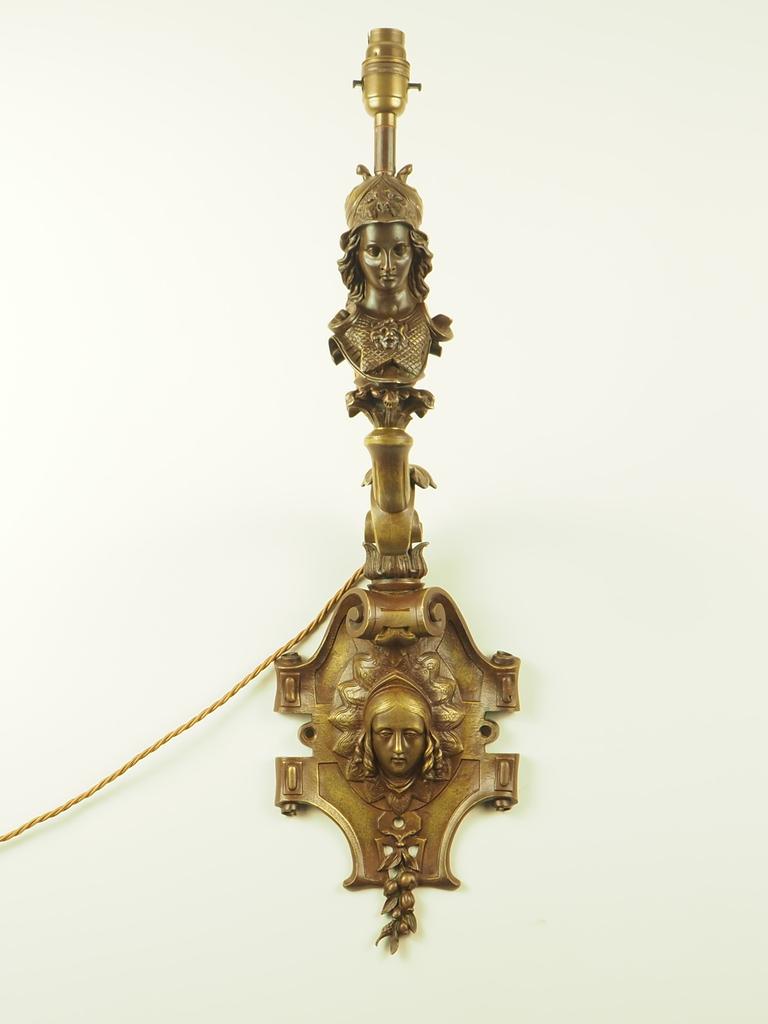 Description

Exquisite Antique Bronze Wall Light is a rare and outstanding wall lamp, featuring intricate details that highlights the craftsmanship of a bygone era, making it a true conversation piece.

The carefully converted gas lamp retains its