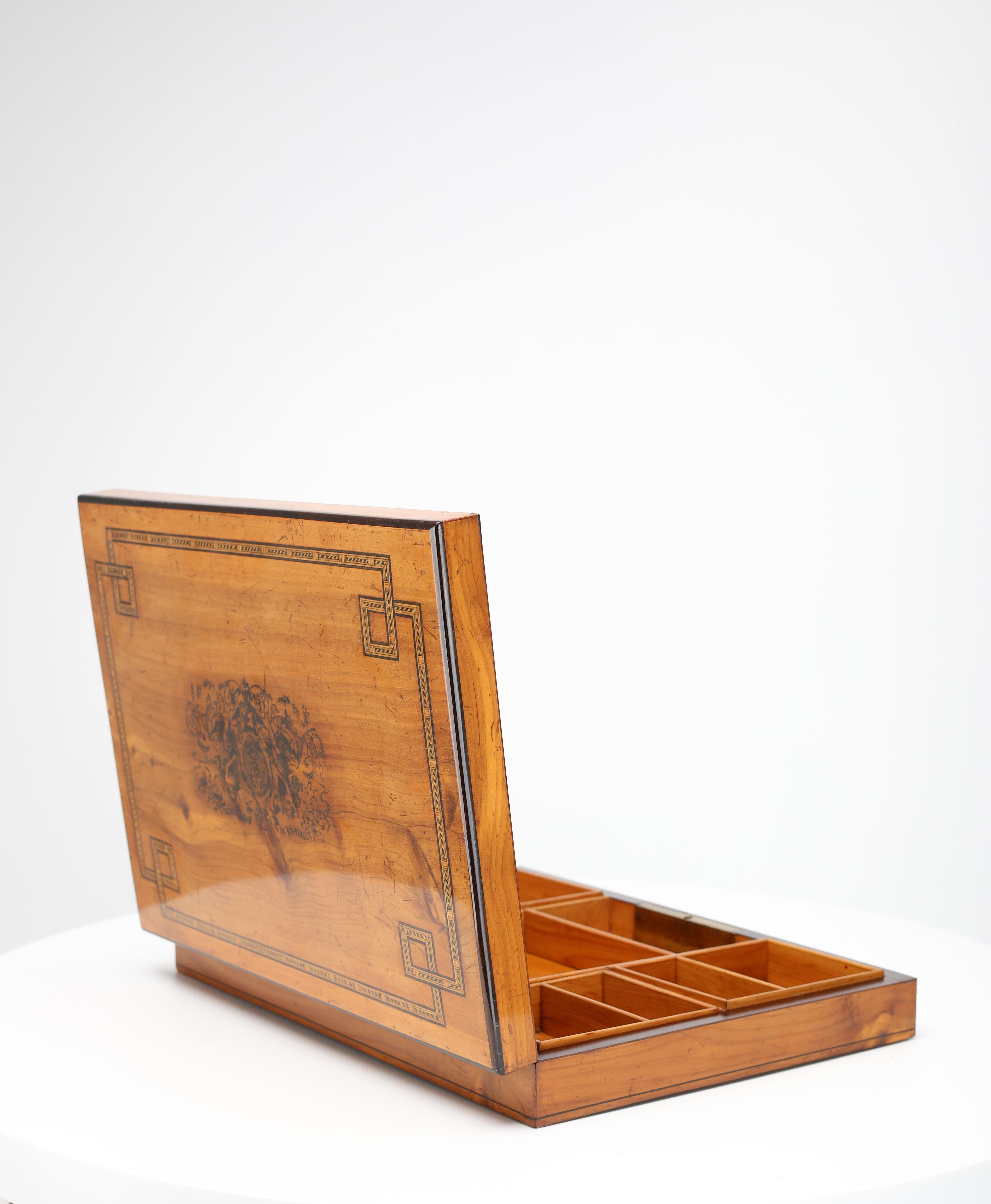 Exquisite Antique Cherrywood Jewelry Casket – Finely Ebonized & Intricately Inlaid

This distinguished antique jewelry casket is a true testament to masterful craftsmanship and refined aesthetics. Crafted from solid cherrywood, the piece radiates