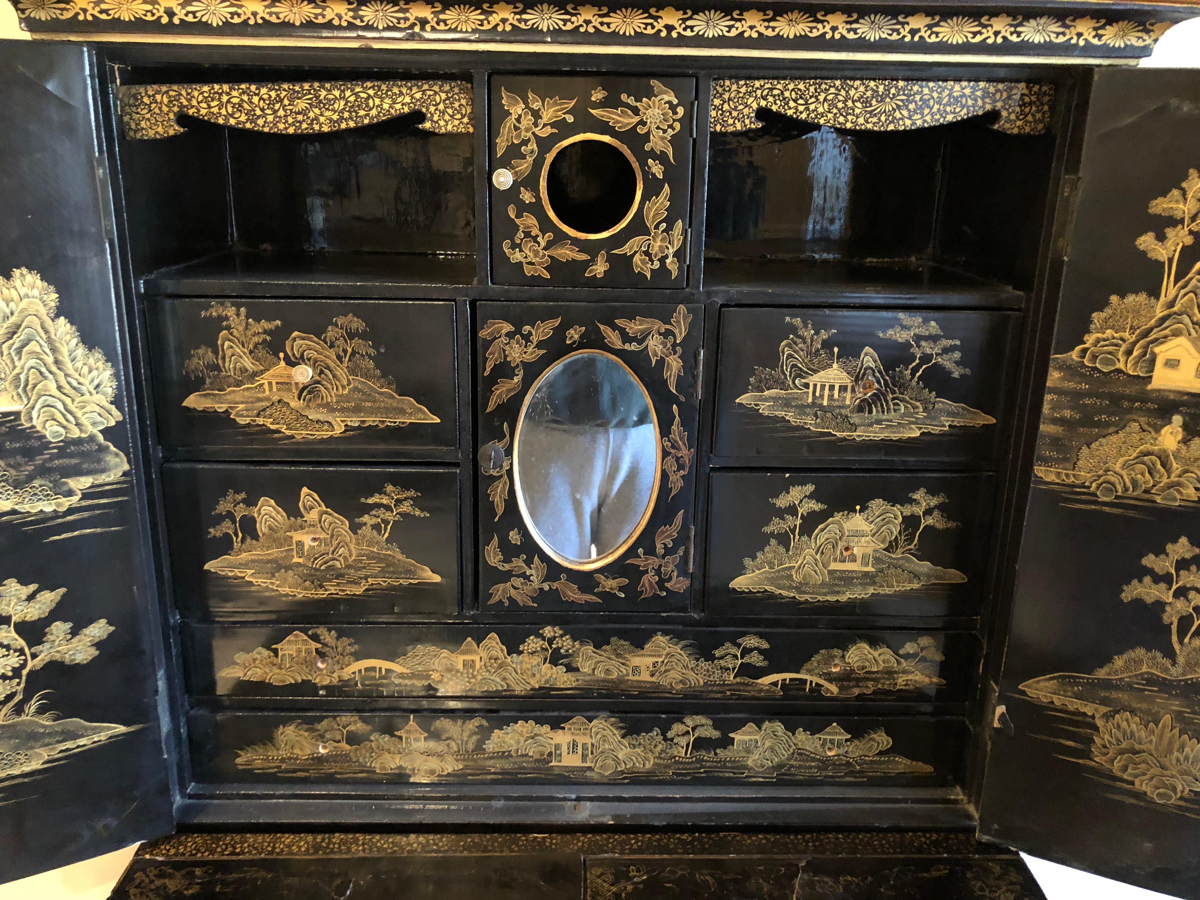 Chinoiserie Exquisite Antique Chinese Export Gilt Decorated Black Lacquer Cabinet on Stand