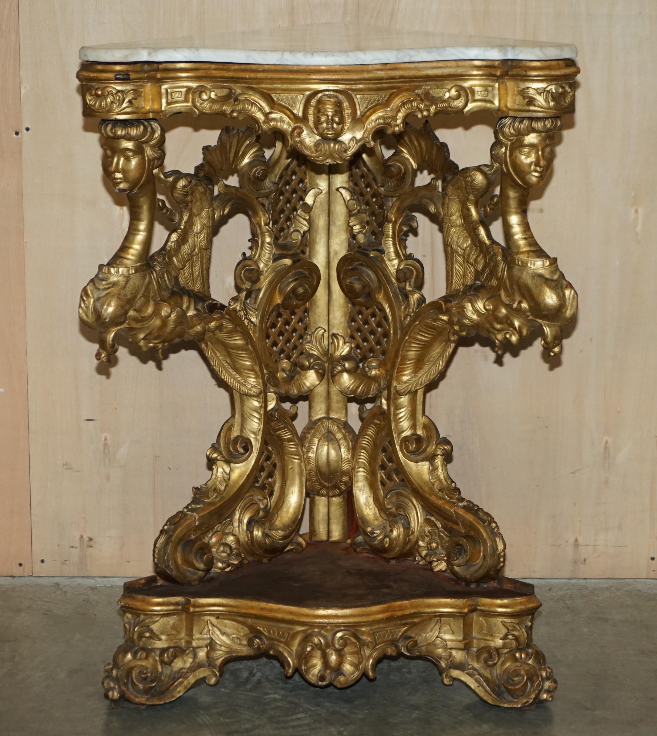 We are delighted to offer for sale this very fine and Important, Italian circa 1860 hand carved corner table with giltwood body and Italian Carrara marble top 

A very collectable and well made, decorative corner table, this is pure art furniture