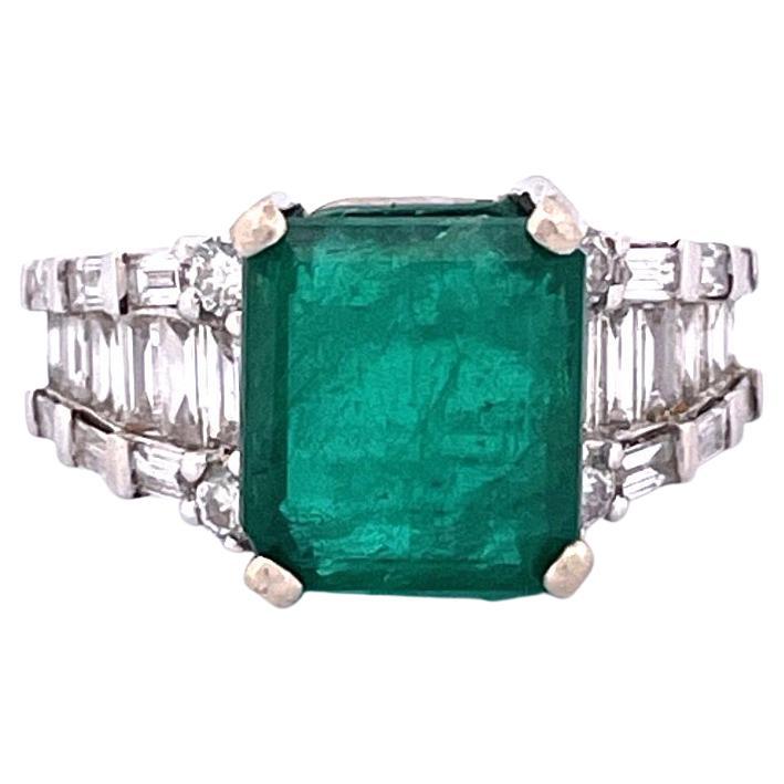 Exquisite Art Deco 18k White Gold Emerald & Diamond Step Cut Ring For Sale