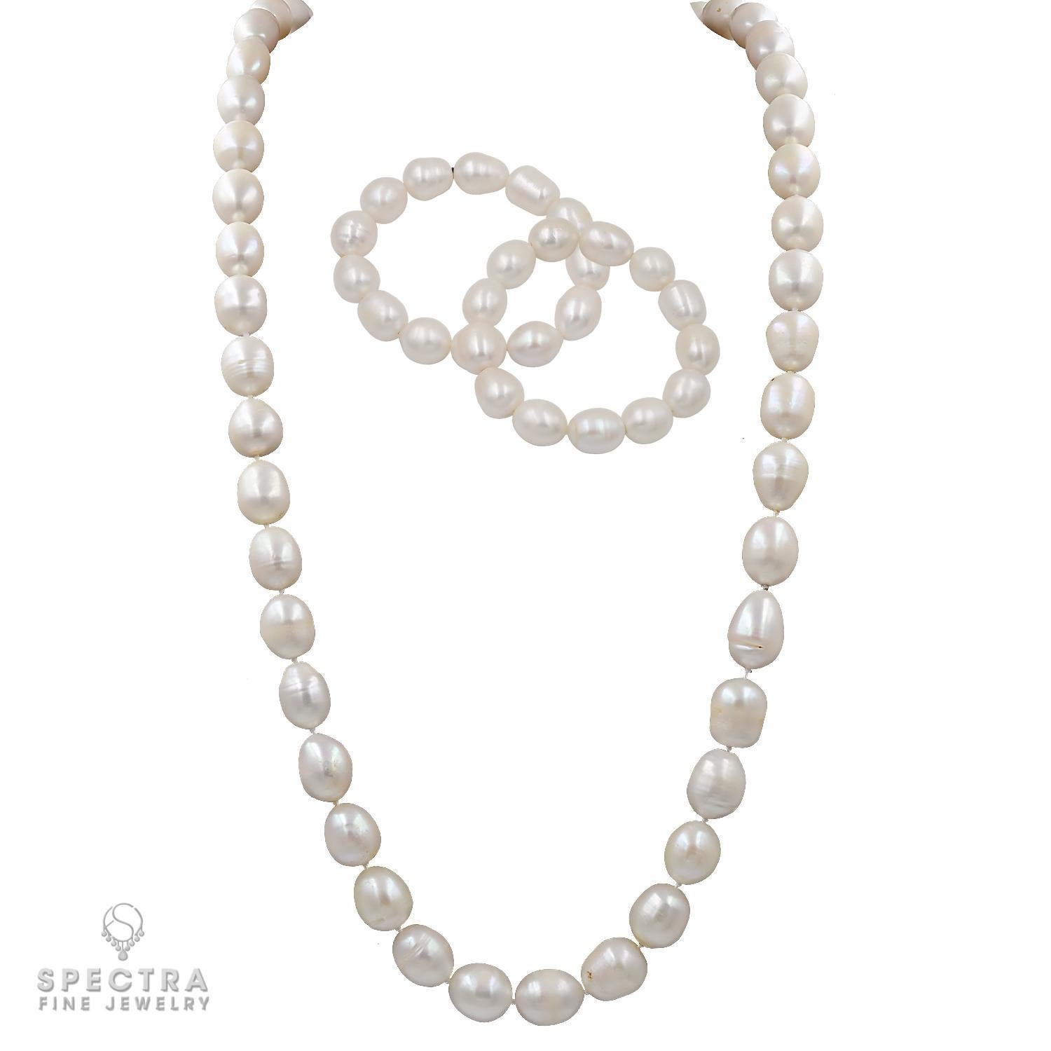Elegance and opulence converge in this lovely Baroque South Sea Pearl Necklace & Bracelet Set, a testament to the timeless allure of pearls. With 47 lustrous pearls adorning the necklace and 13 pearls in each of the two matching bracelets, this set
