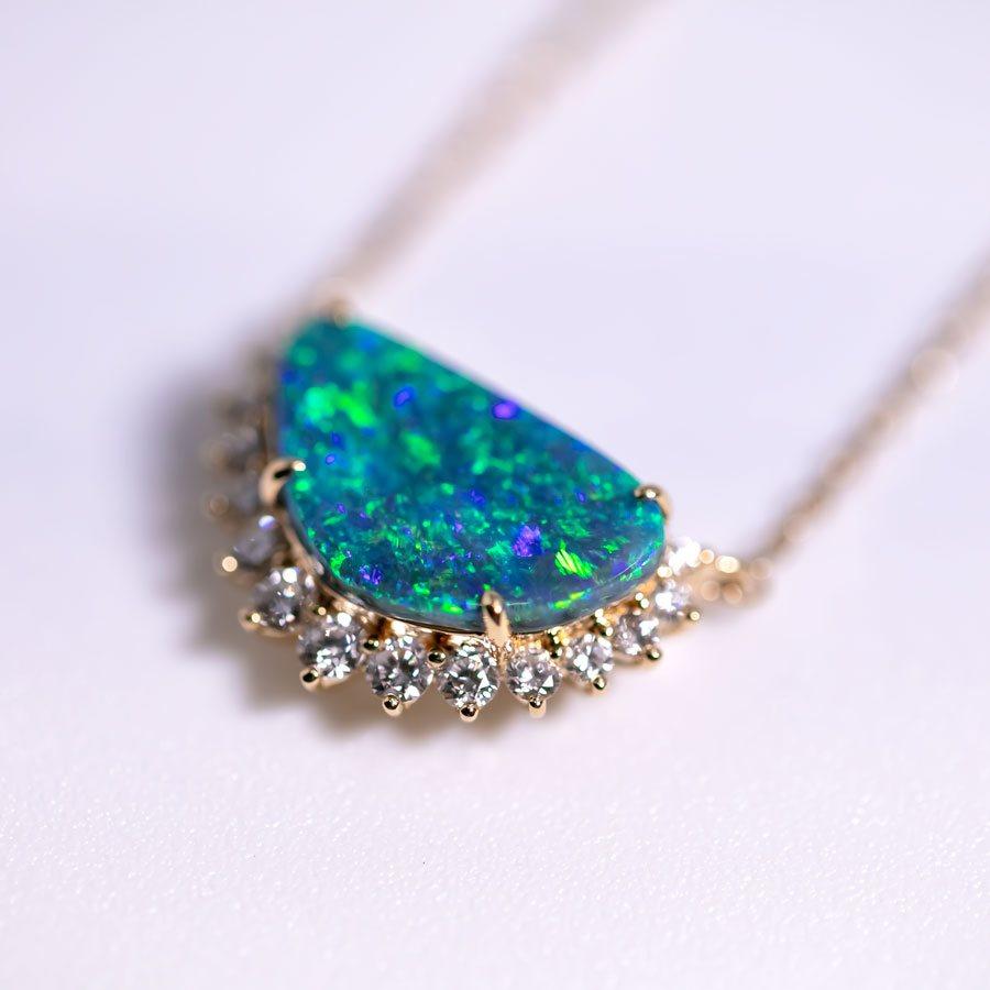 Exquisite Australian Black Opal Halo Diamond Necklace 18K Yellow Gold.


Free Domestic USPS First Class Shipping! Free Gift Bag or Box with every order!

Opal—the queen of gemstones, is one of the most beautiful gemstones in the world. Every piece