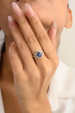 Magnifique bague de fiançailles en or blanc 14 carats avec saphir bleu et diamants