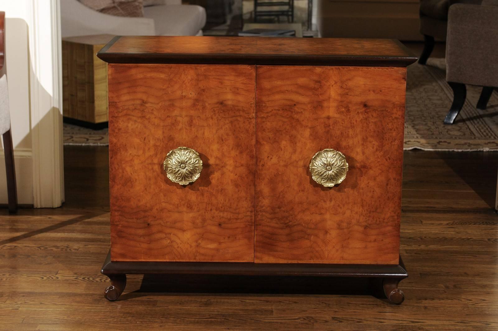 This magnificent chest is shipped as professionally photographed and described in the listing narrative: Meticulously professionally restored and completely installation ready.

A stunning cabinet by John Stuart, circa 1940. Expertly crafted