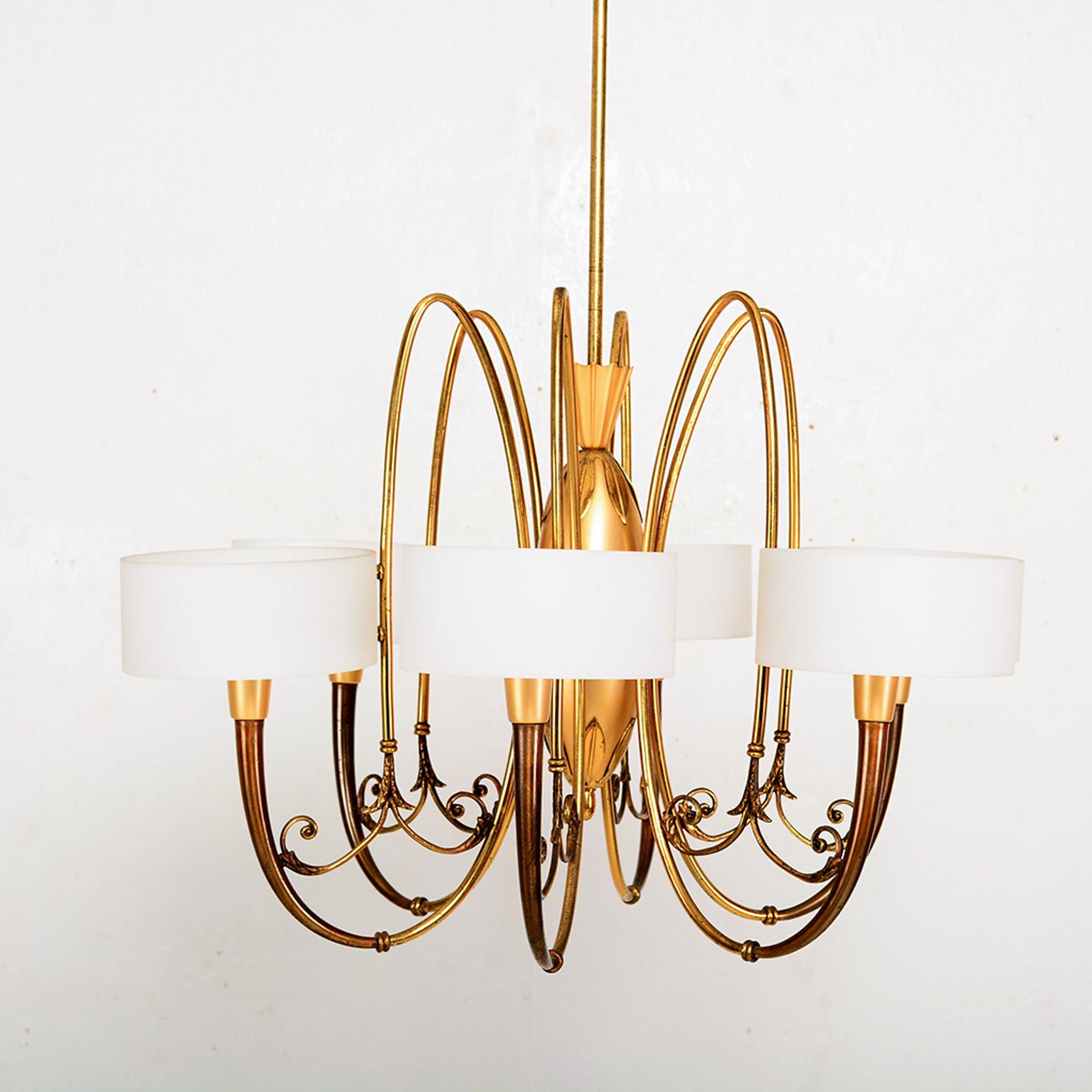 For your consideration: exquisite Mid Century Modern BRASS MULTI TONE  Sculpted Chandelier Made in Italy circa 1950

Features sculptural arms with decorative accents includes round glass shades/diffusers. The chandelier is constructed with brass