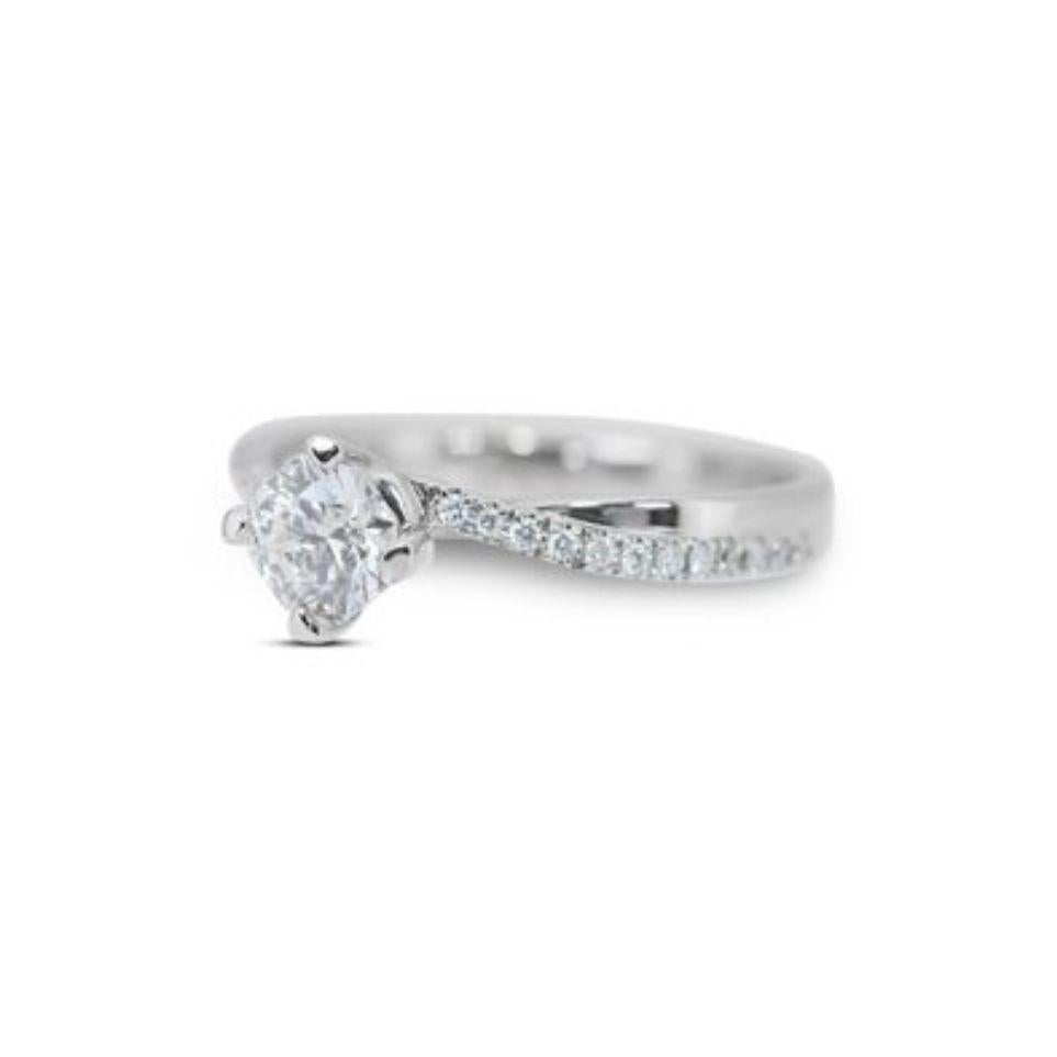 Round Cut Exquisite Brilliance: 0.7ct D Color Diamond Ring with Cascading Light  For Sale