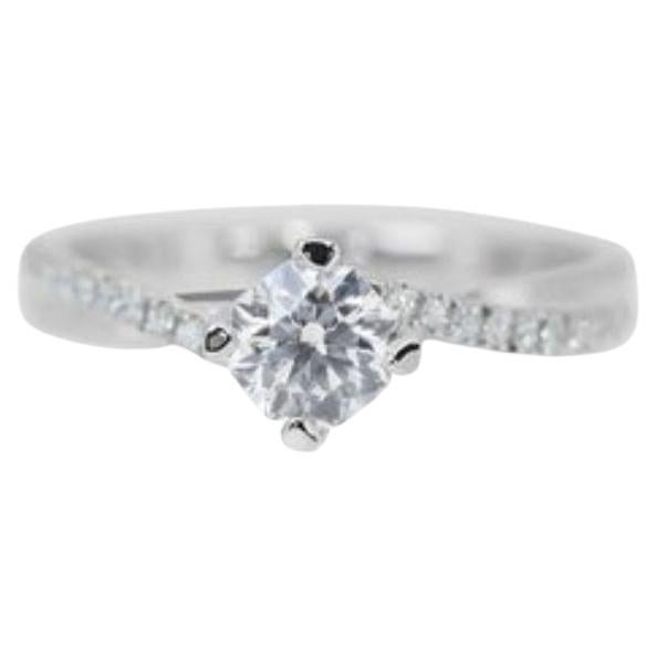 Exquisite Brilliance: 0.7ct D Color Diamond Ring with Cascading Light  For Sale