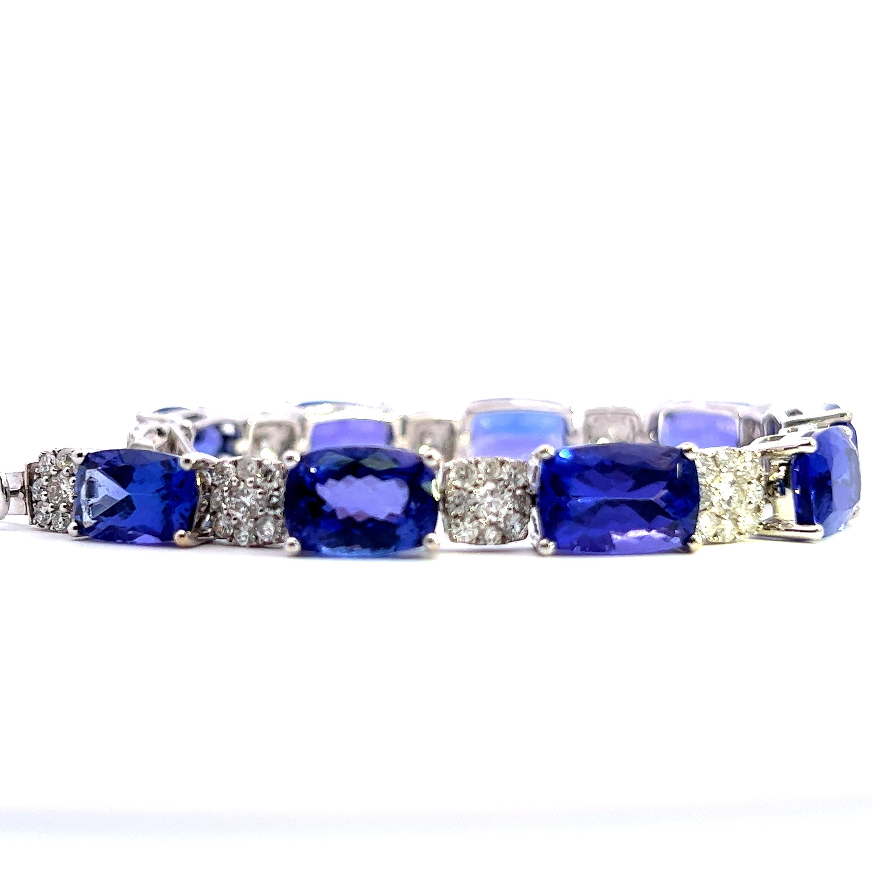Exquisite Brilliance: 18KW Tanzanite Cushion Bracelet - Vivid AAA Quality In New Condition For Sale In Great Neck Plaza, NY