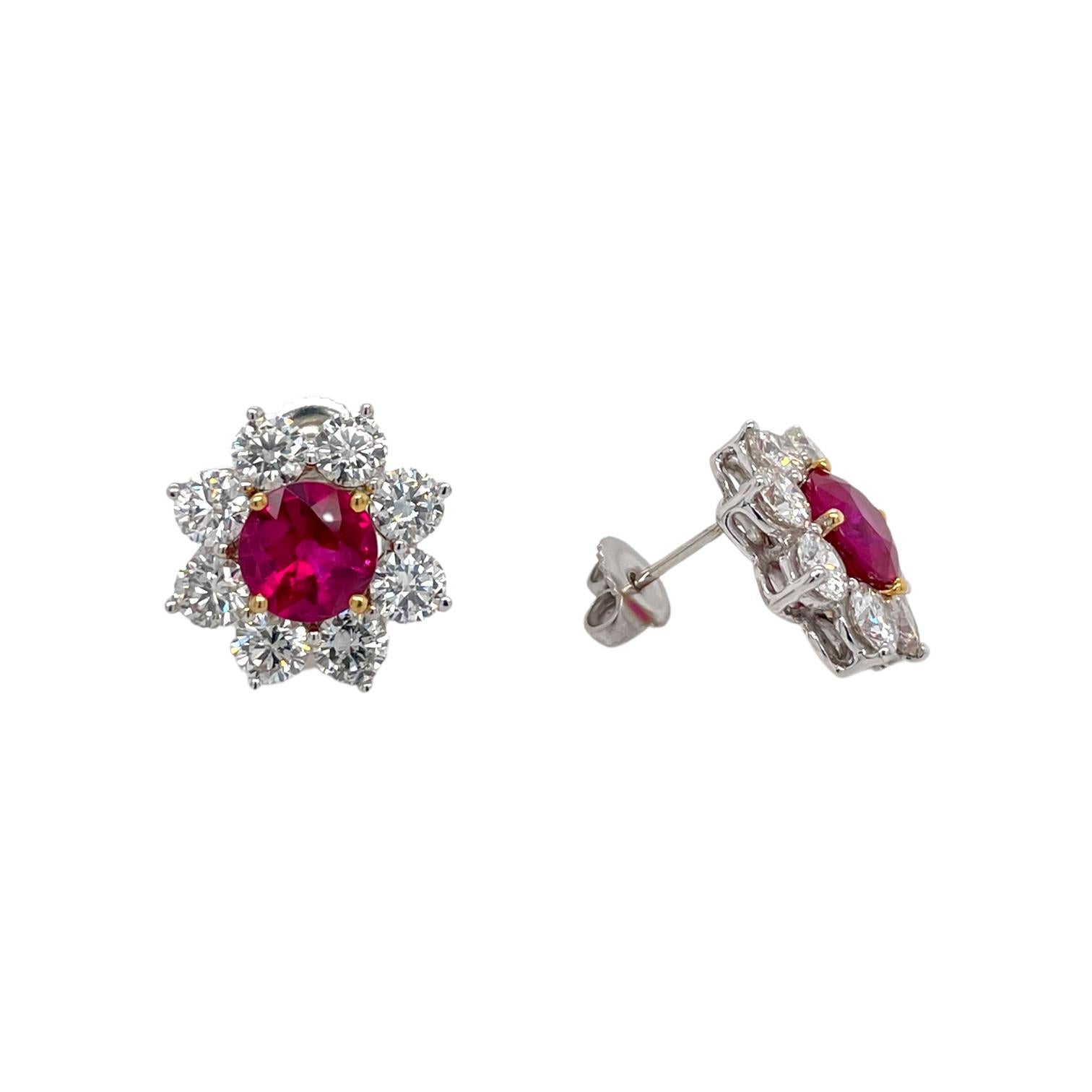 Earrings contain 2 round Burmese rubies, 2.89tcw and 16 round brilliant diamonds, 3.50tcw. Rubies are AGL certified and set in 18k yellow gold. Diamonds are colorless, VS in clarity, excellent cut and set in 18k white gold. All stones are mounted in