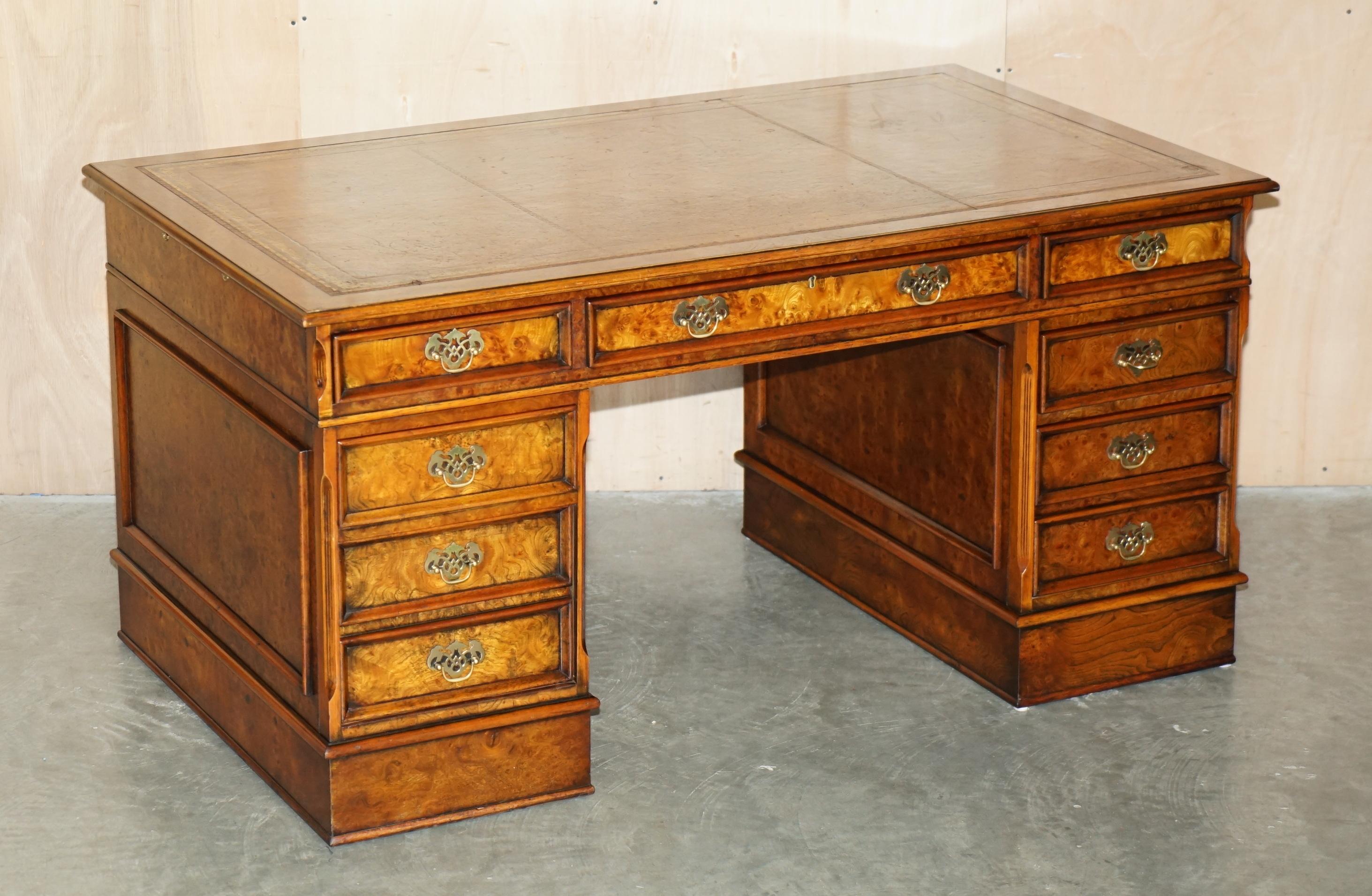 Royal House Antiques

Royal House Antiques is delighted to offer for sale this absolutely exquisite Charles Lowe & Son's Burr Walnut brown leather twin pedestal partner desk with two slip serving trays 

Please note the delivery fee listed is just a