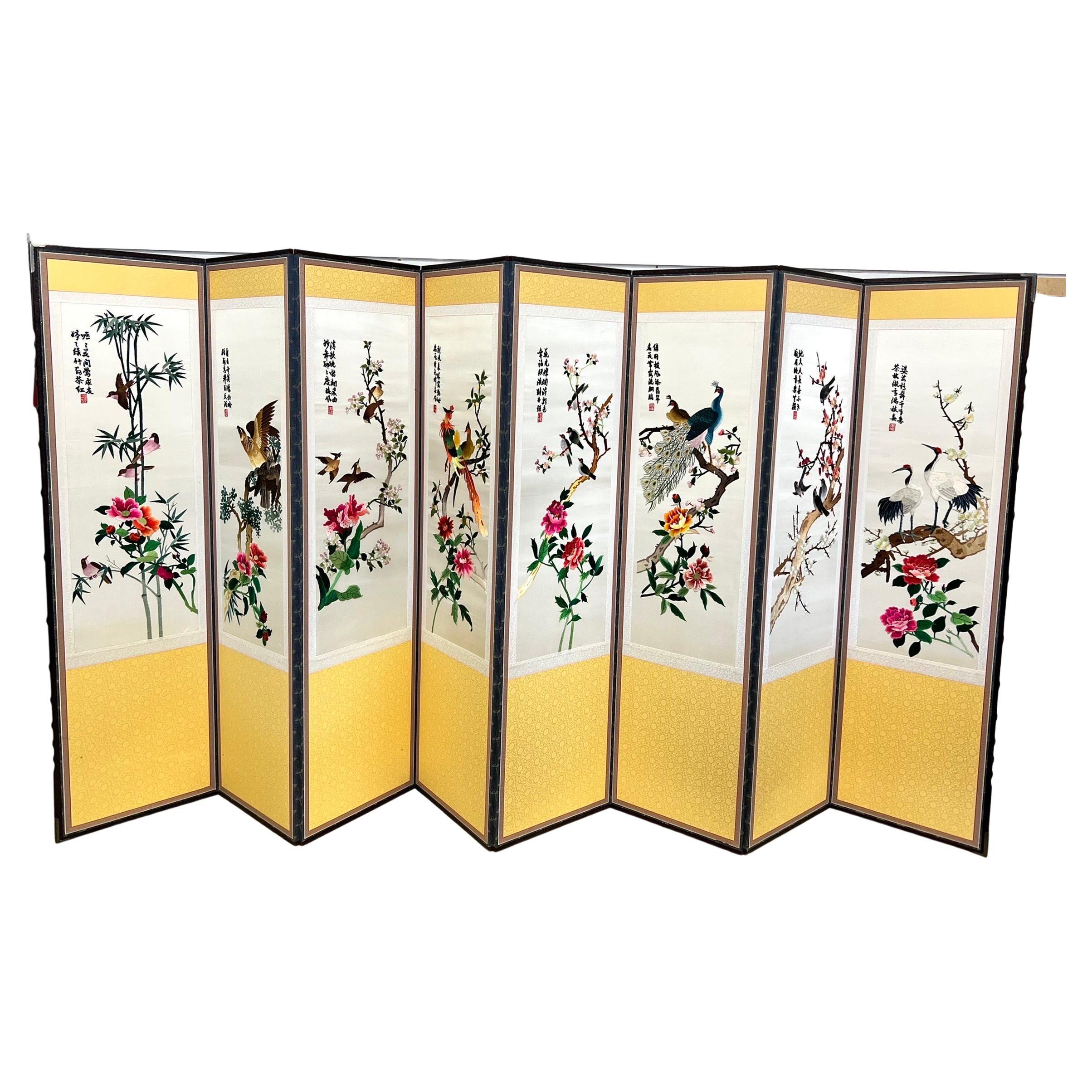 Stunning eight panel Asian folding screen with exceptional embroidered detail on each panel. The color scheme is exquisite and like none we have seen before.

There is two tone color on back - see pics. There is signature on front of each panel