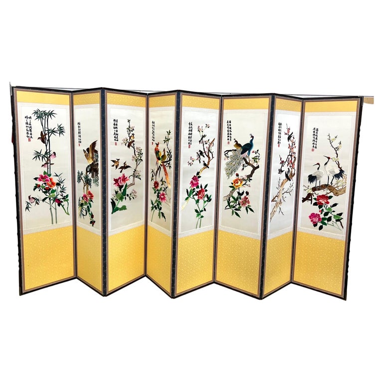 Stunning eight panel Asian folding screen with exceptional embroidered detail on each panel. The color scheme is exquisite and like none we have seen before.

There is two tone color on back - see pics. There is signature on front of each panel