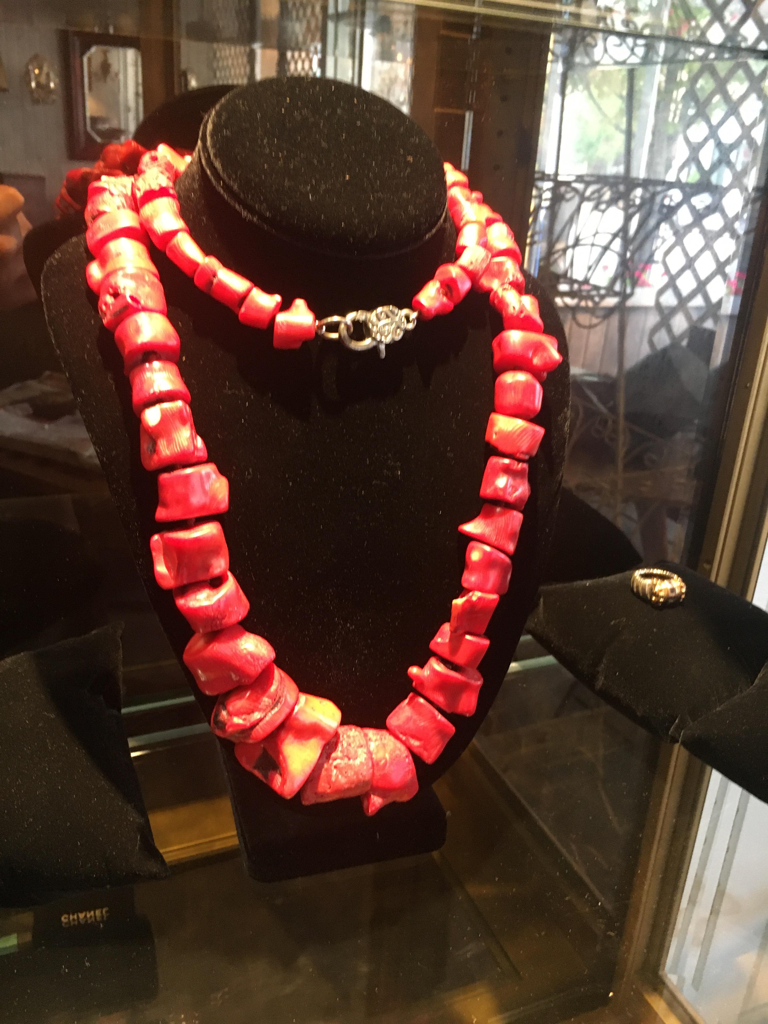 coral color necklace