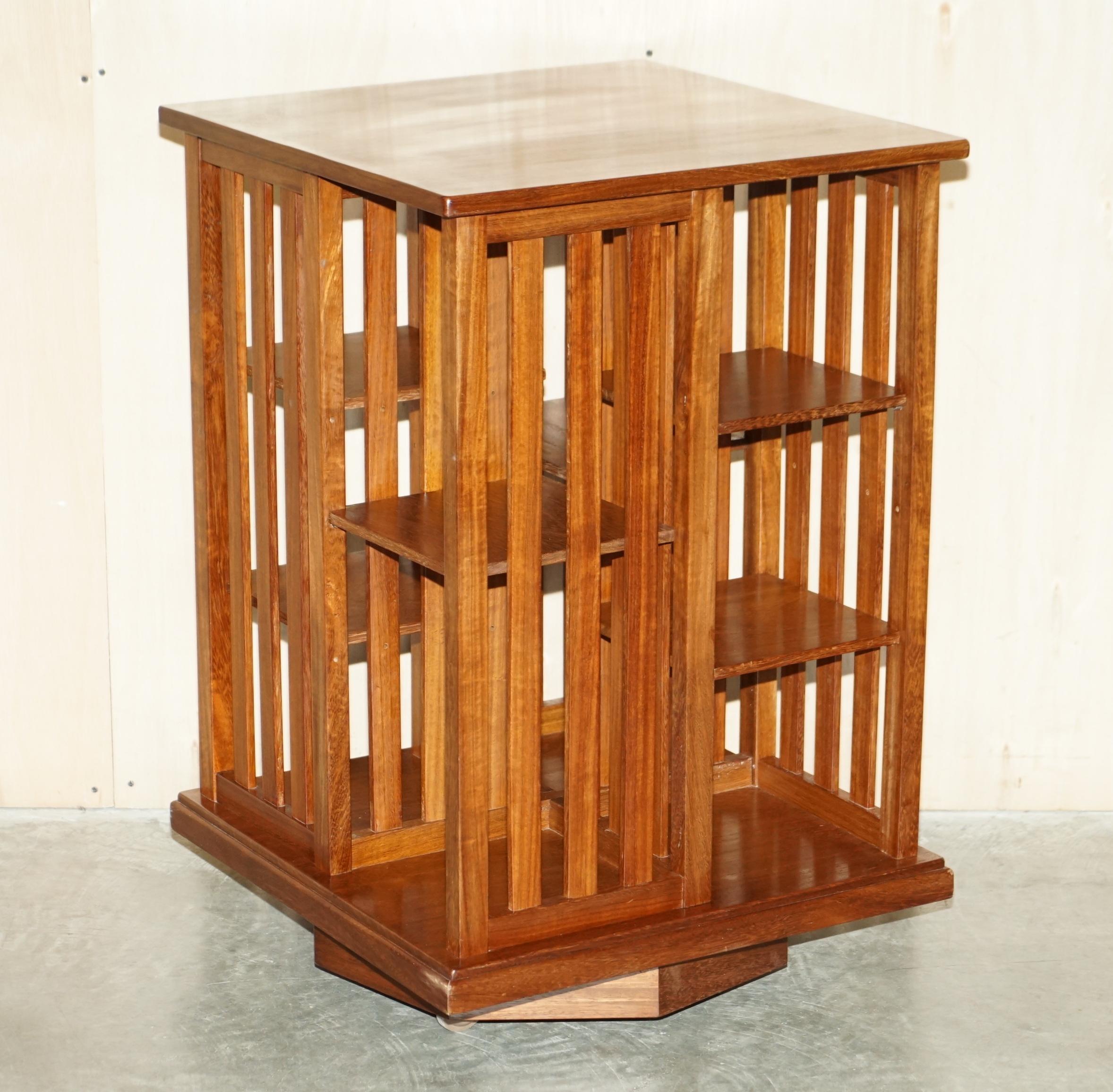 We are delighted to offer for sale this lovely English flamed mahogany circa 1920 Art Deco revolving bookcase table

A good looking and well made piece, the timber cuts are exquisite, they look to be Honduras mahogany which is super fine, you find