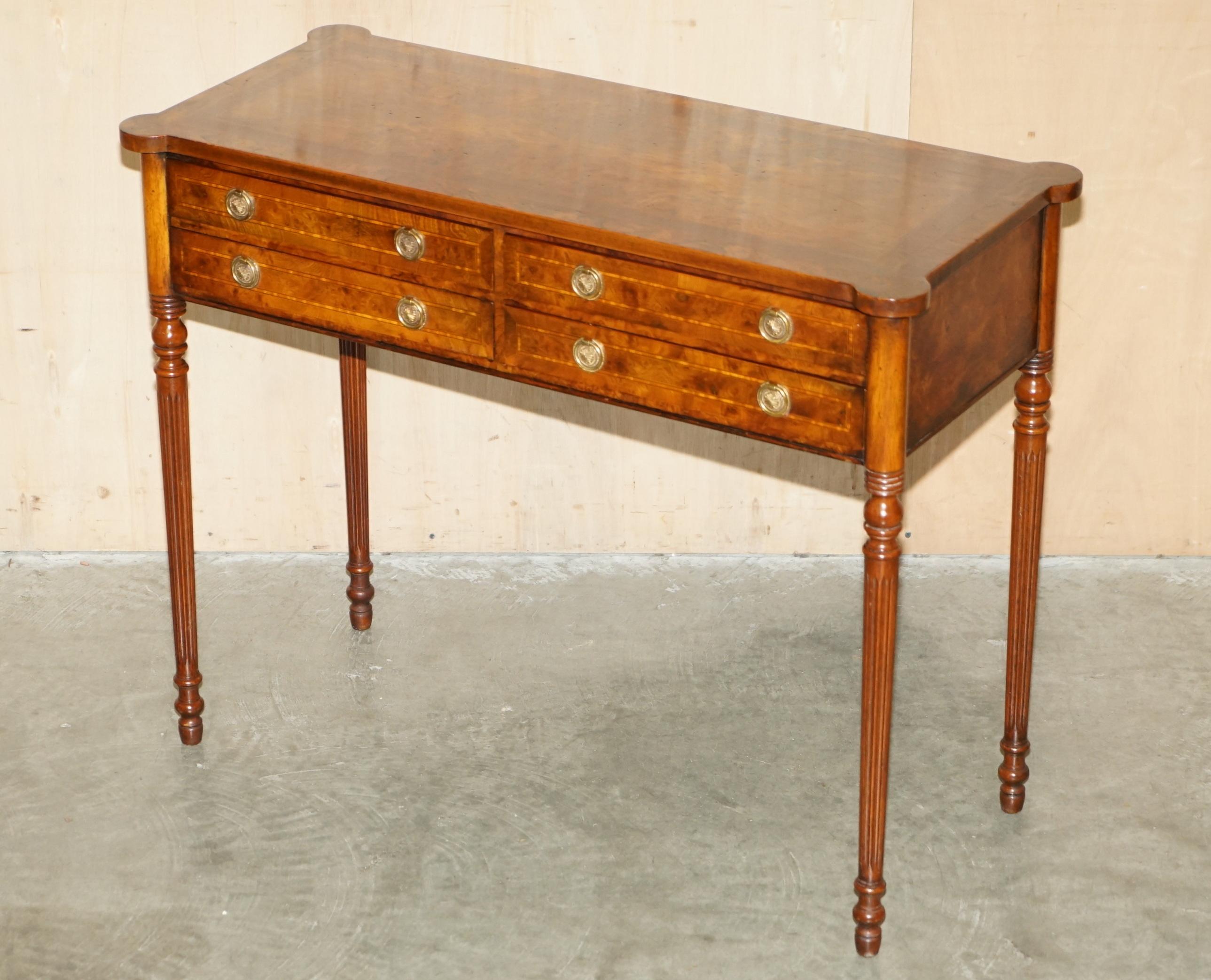 Royal House Antiques

Royal House Antiques is delighted to offer for sale this absolutely lovely fully restored Burr Elm & Satinwood console table with four drawers on turned fluted legs that has been French Polished 

Please note the delivery fee