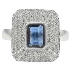 Exquise bague en or blanc massif 18 carats, diamant et saphir bleu taille émeraude