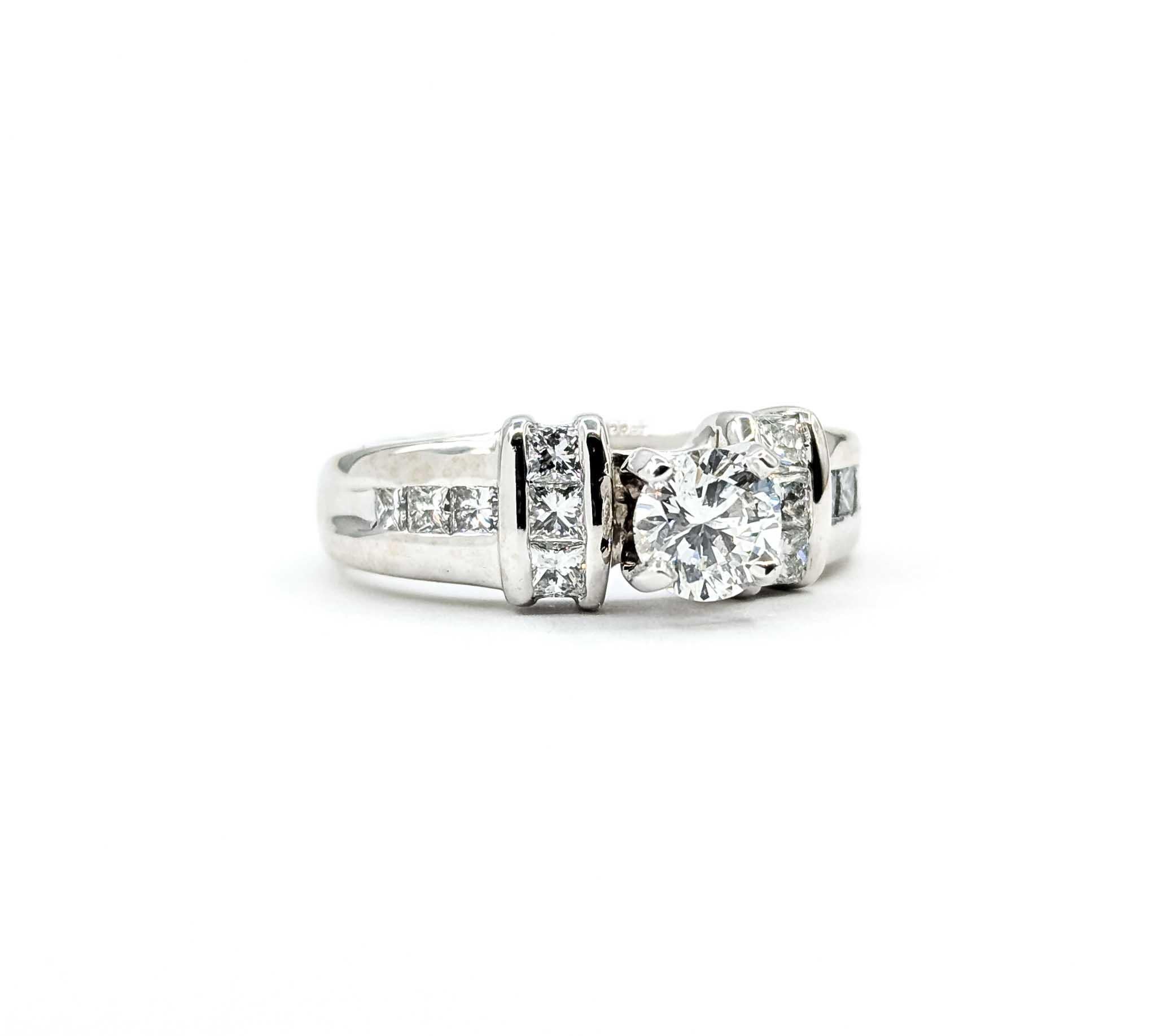 Exquisite Diamond Engagement Ring in 14k White Gold

Introducing this exquisite diamond engagement ring, crafted with precision in 14k white gold. The ring showcases a channel-set design that elegantly features a sparkling 0.70-carat diamond at its