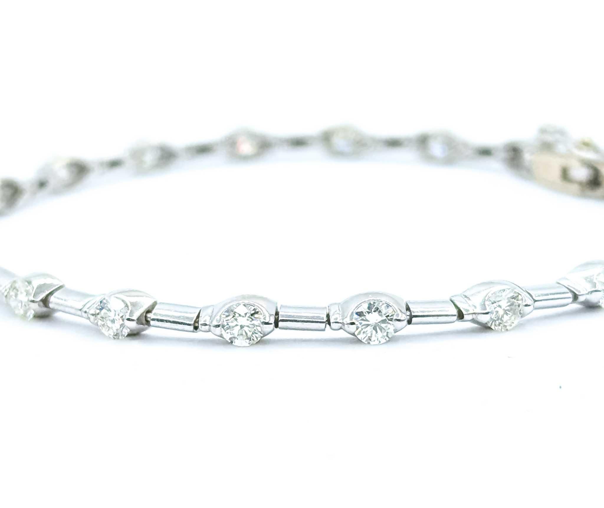 Exquisite Diamond Fashion Bracelet in 18K White Gold

Introducing this exquisite diamond fashion bracelet, crafted in luxurious 18K white gold. This elegant bracelet showcases a sophisticated prong setting, accentuating the brilliance of its