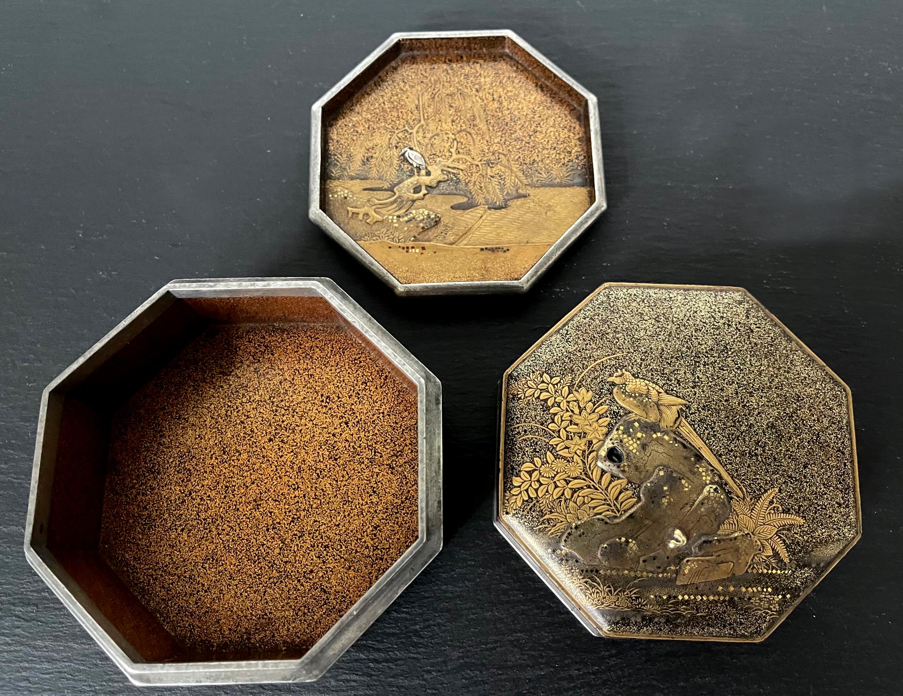 An early Japanese lacquer kobako (small box) in octagon shape circa 16th-17th century (late Muromachi to Momoyama period). This kobako was possibly used as a kogo to store incense. It features an inner tray and silver metal rim. The execution of the