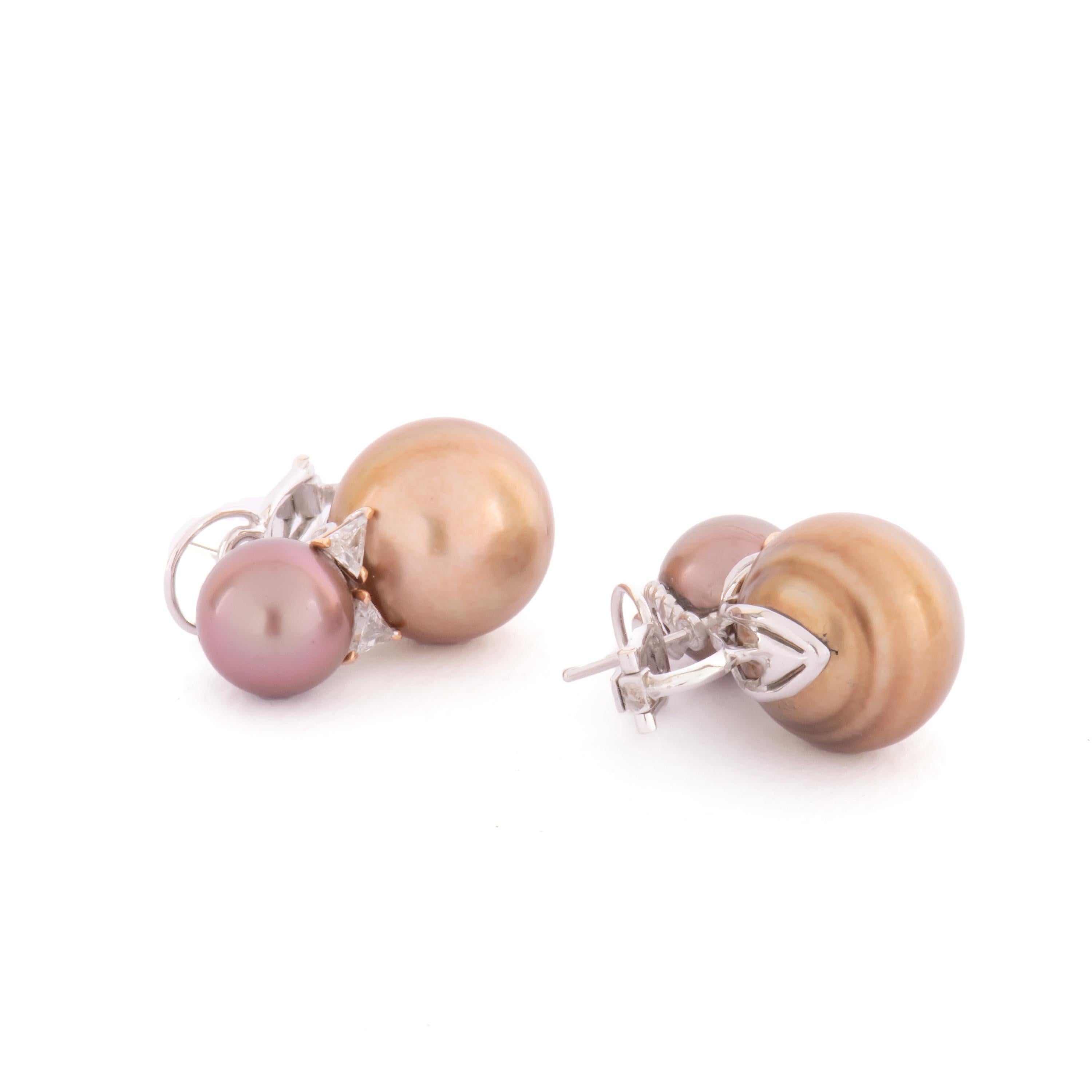 These amazing white gold earrings by Enrico Trizio feature a lustrous ct 37,34 Tahitian Brown pearls and ct 0,59 trilliant cut diamonds.