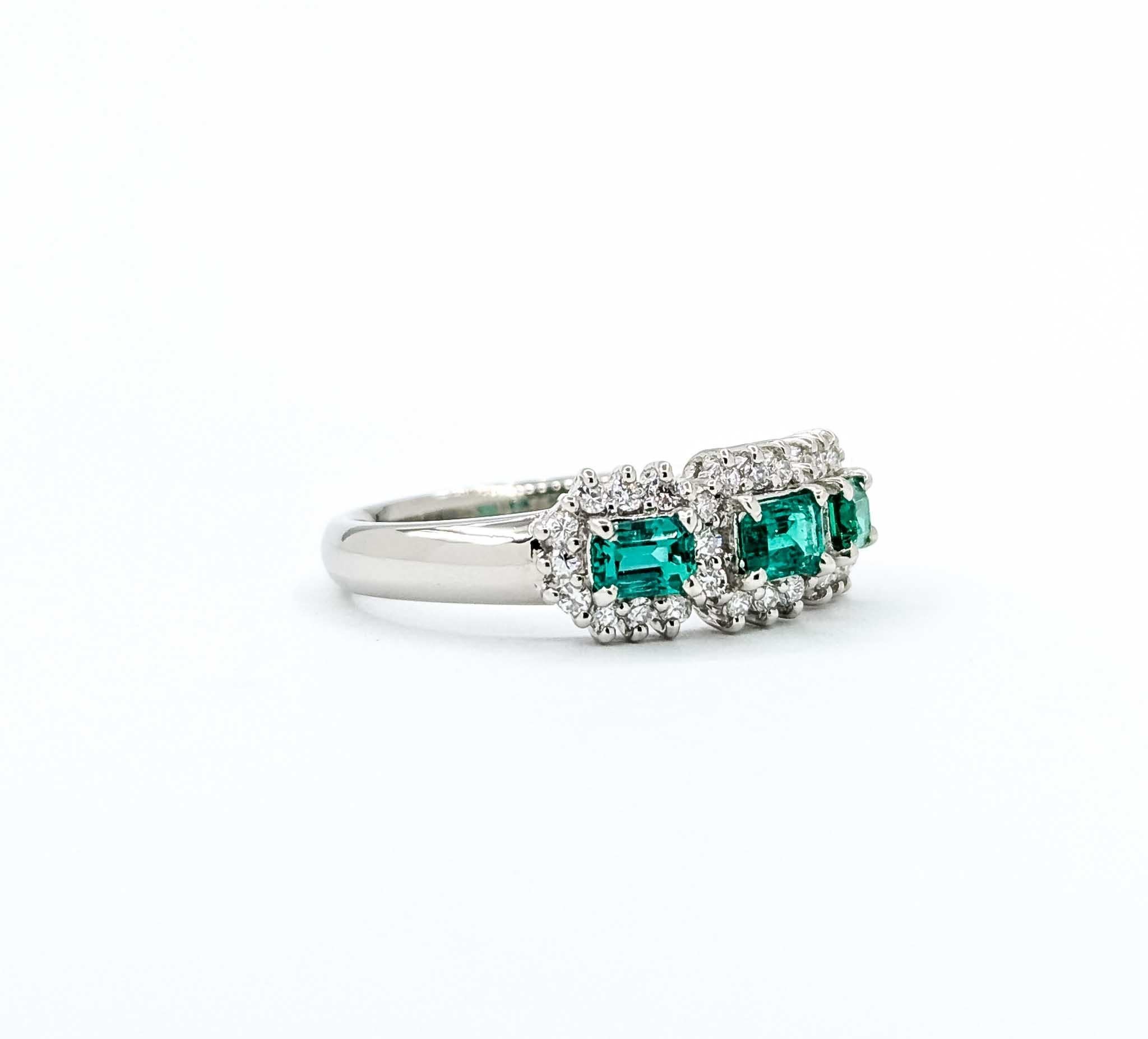 Exquisite Emerald and Diamond Ring in 900pt 3-Stone Halo Setting

Embark on a journey of timeless elegance with our Exquisite Emerald and Diamond Ring, thoughtfully crafted in 900pt. This compelling piece of jewelry takes center stage with a