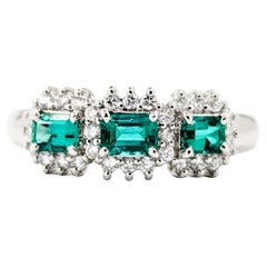 Vintage Exquisite Emerald and Diamond Ring in 900pt 3-Stone Halo Setting
