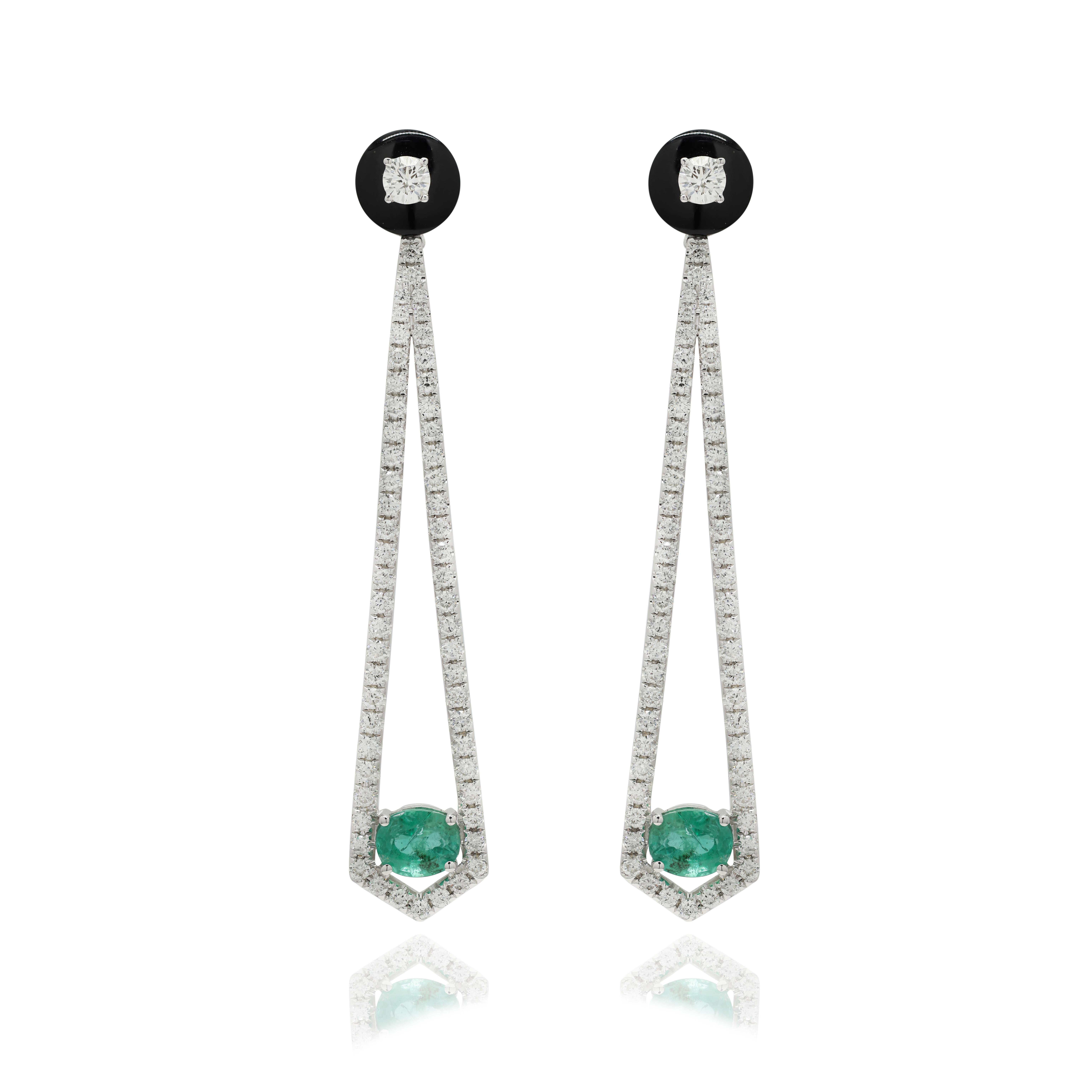 Designer Emerald and Diamond Long Dangle Earrings to make a statement with your look. These earrings create a sparkling, luxurious look featuring oval cut gemstone.
If you love to gravitate towards unique styles, this piece of jewelry is perfect for