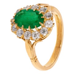 Vintage Exquisite Emerald Ring with White Diamond Surround