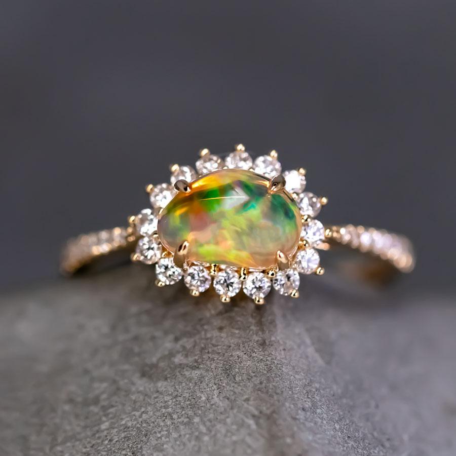 Exquisite Mexican Fire Opal Halo Diamond Engagement Ring 18K Yellow Gold.


Free Domestic USPS First Class Shipping! Free Gift Bag or Box with every order!

Opal—the queen of gemstones, is one of the most beautiful gemstones in the world. Every