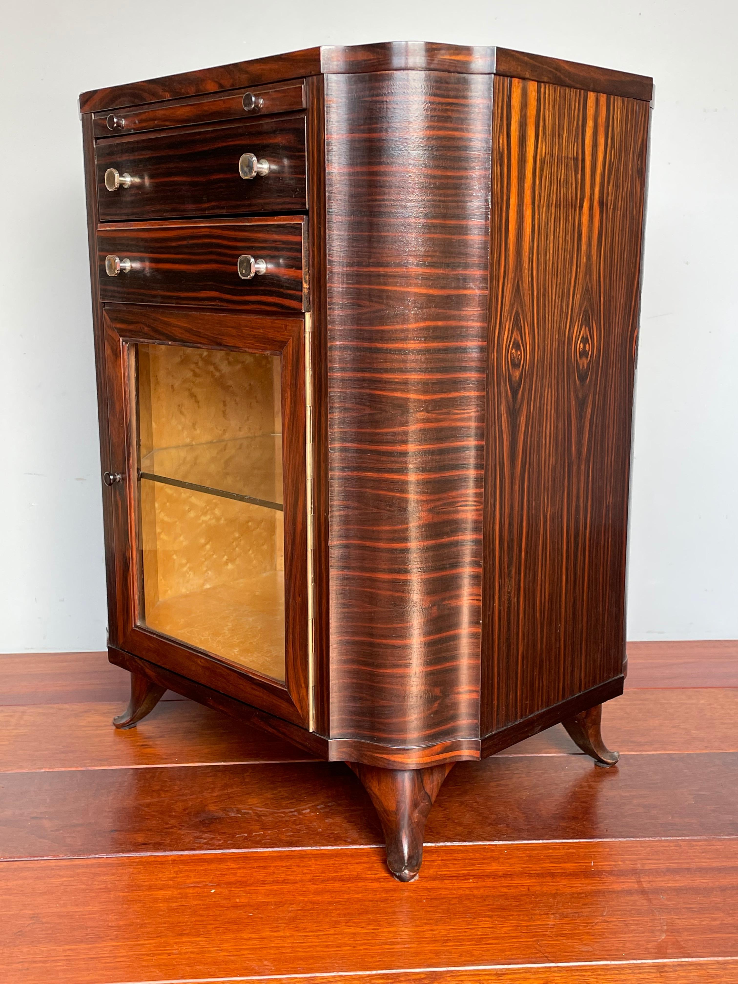 Stunning small size Art Deco cabinet with silvered bronze handles on the drawers.

When it comes to antiques, somehow we have always known what to buy when it comes to quality, beauty and practicality. We don't know why, but those right pieces also