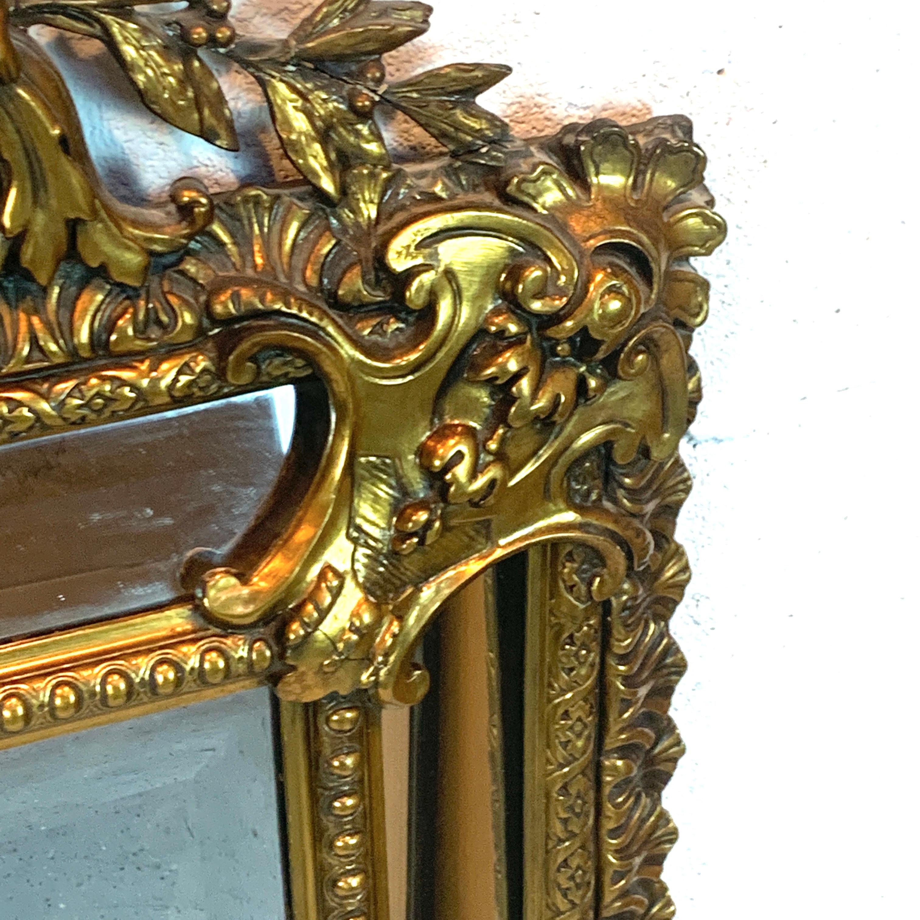 Romantic Exquisite French Carved Giltwood Putti Motif Cushioned Mirror, Paris, 1900