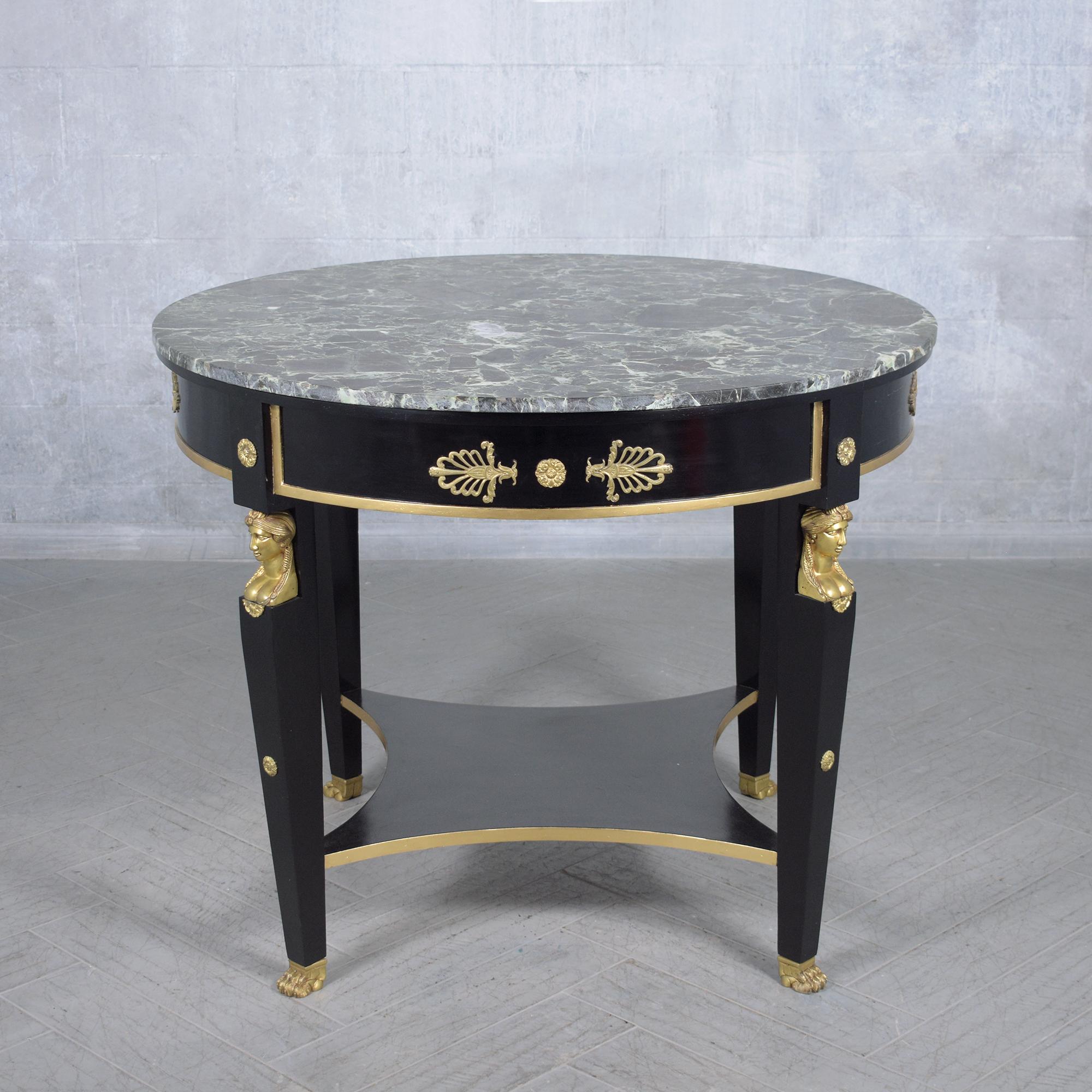 Immerse yourself in the elegance of our French Empire-style round center table, a masterpiece of design and craftsmanship brought to life by our expert team. Crafted from premium mahogany wood, this antique table shines with a deep black, glossy