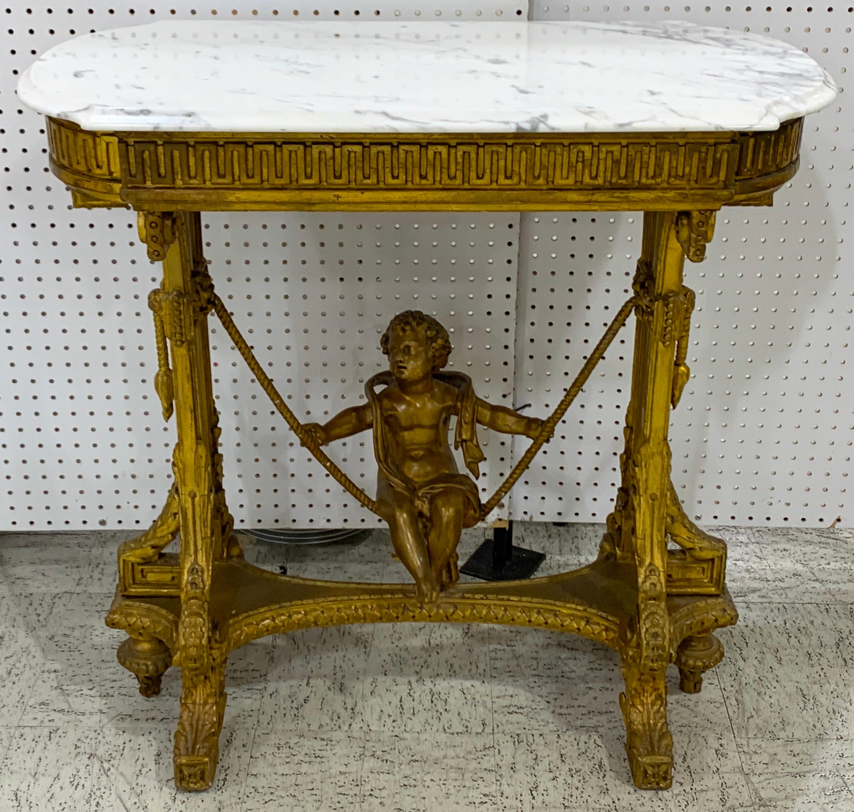 Exquisite French giltwood swinging putto marble-top table/ Ferner, with beveled Carrara marble top revealing a removable 29.5