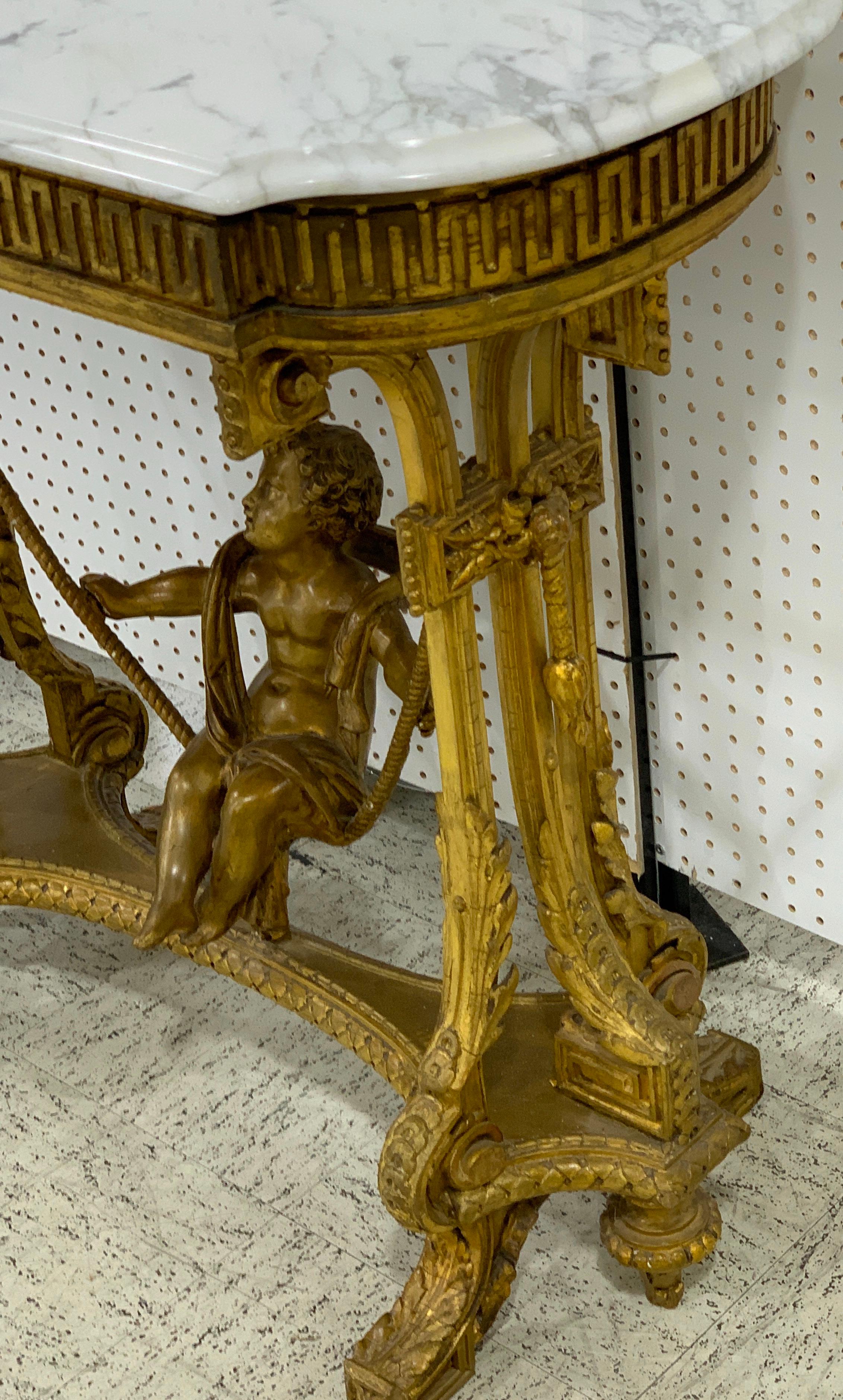 High Victorian Exquisite French Giltwood Swinging Putto Marble Top Table/ Ferner  For Sale