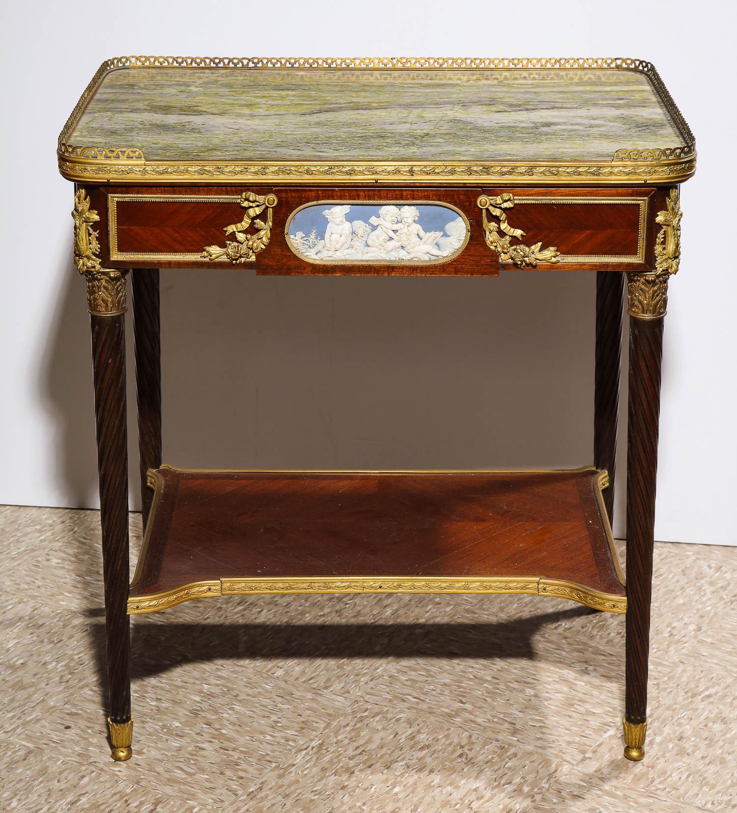 An exquisite quality French ormolu and wedgewood / jasperware mounted table with marble top.

circa 1880, attributed to Henry Dasson / Paul Sormani

Very high quality bronze mounts. With drawer. 

Excellent condition. Ready to place and