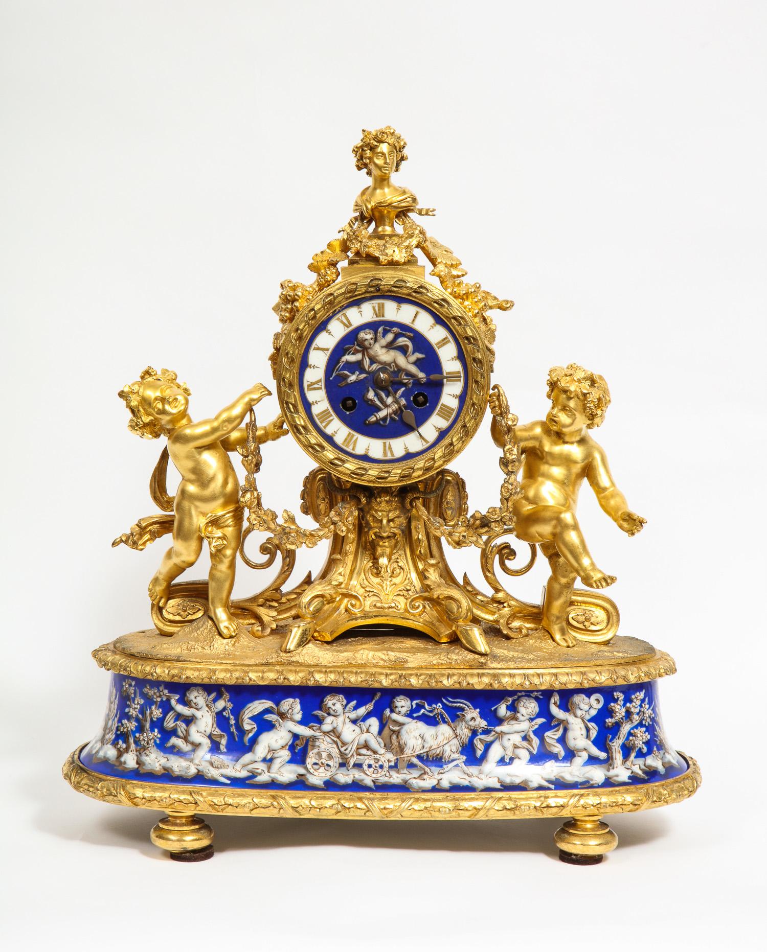 Napoleon III Exquisite French Ormolu Bronze and Blue Porcelain Mounted Three-Piece Clock Set