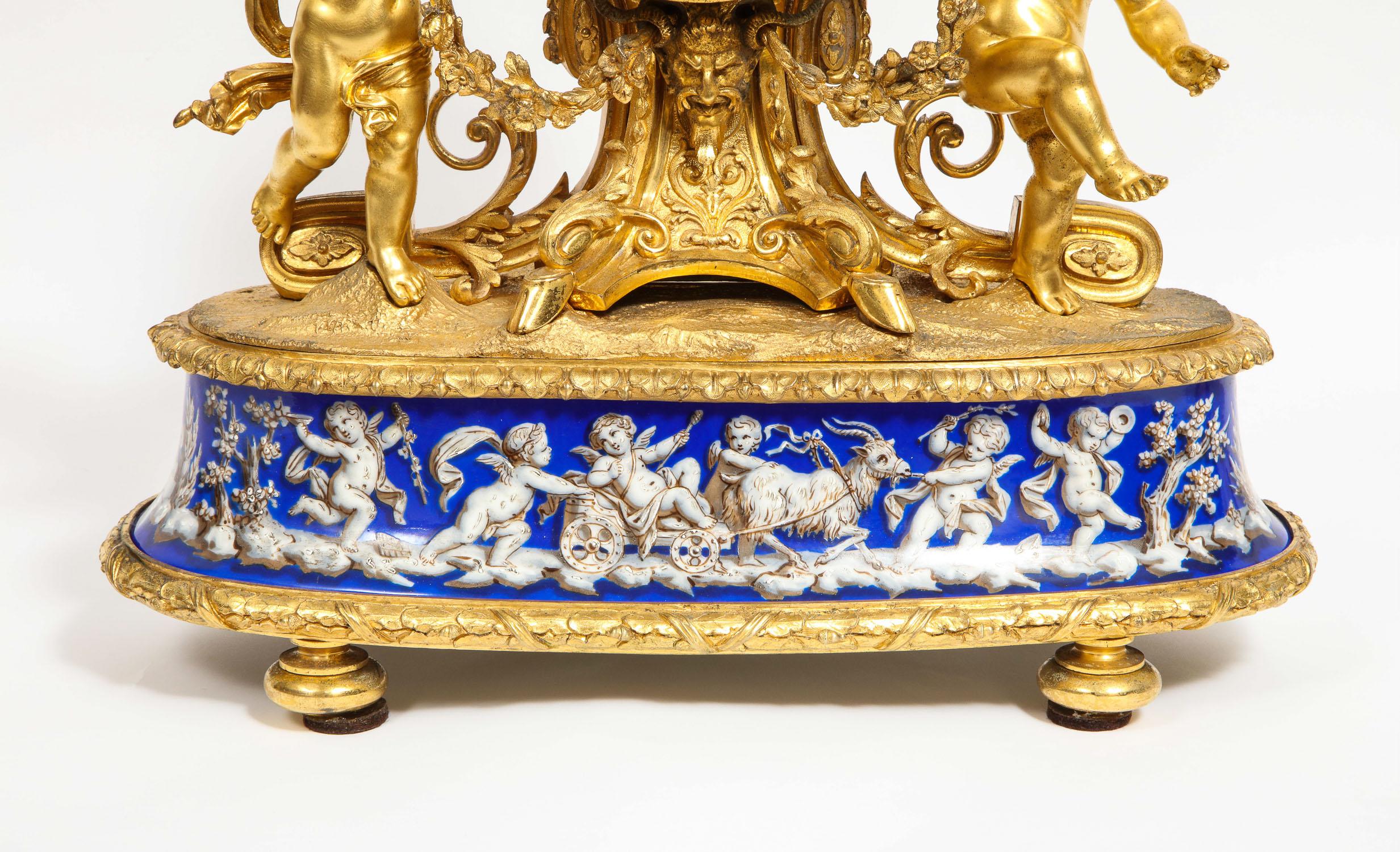Exquisite French Ormolu Bronze and Blue Porcelain Mounted Three-Piece Clock Set In Good Condition In Queens, NY