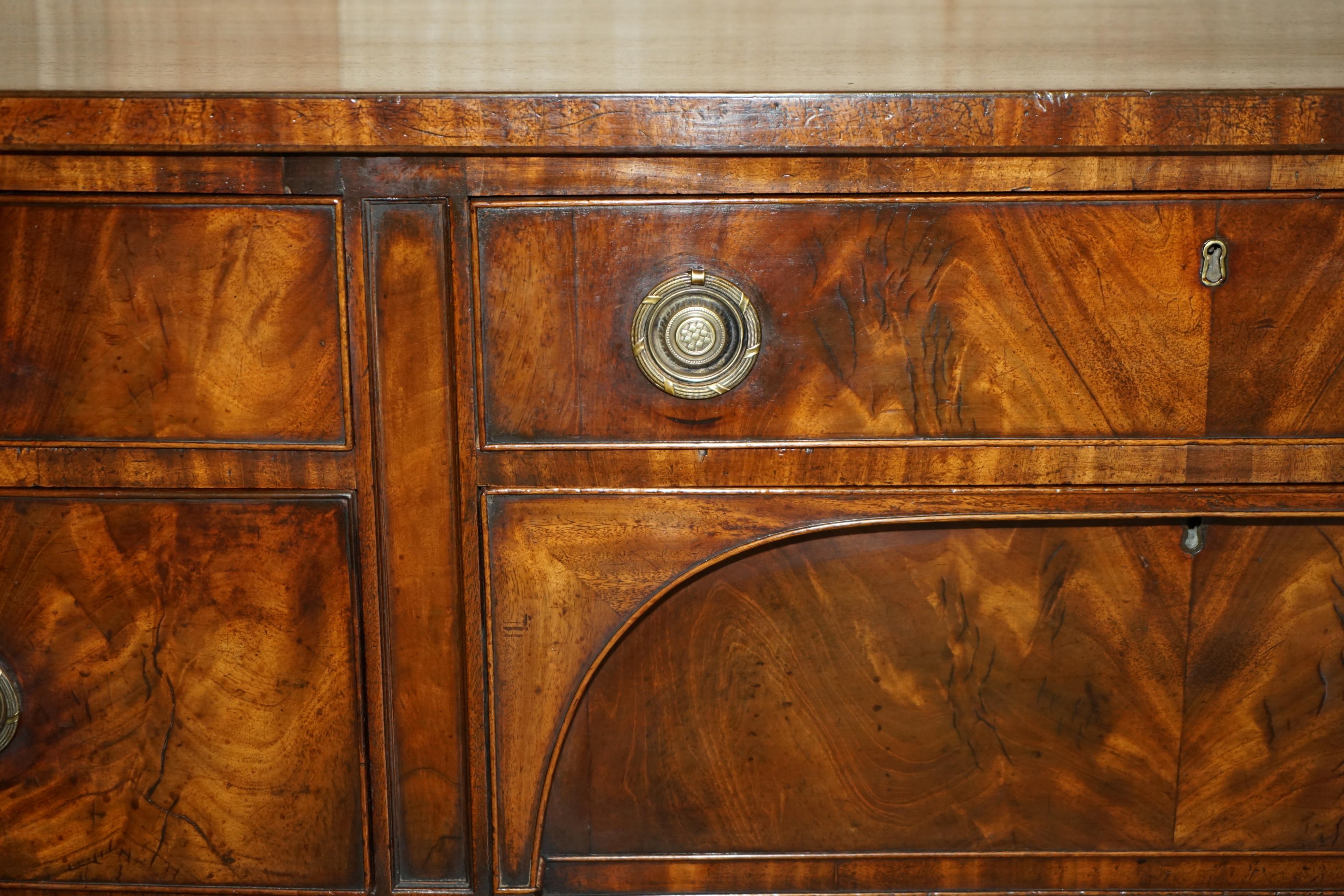 Hand-Crafted EXQUISITE FULLY RESTORED ENGLISH GEORGE III CiRCA 1780 FLAMED HARDWOOD SIDEBOARD For Sale