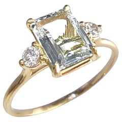 Bague pour femme en or jaune 18 carats avec aigue-marine de 0,88 carat et diamants de 0,12 carat