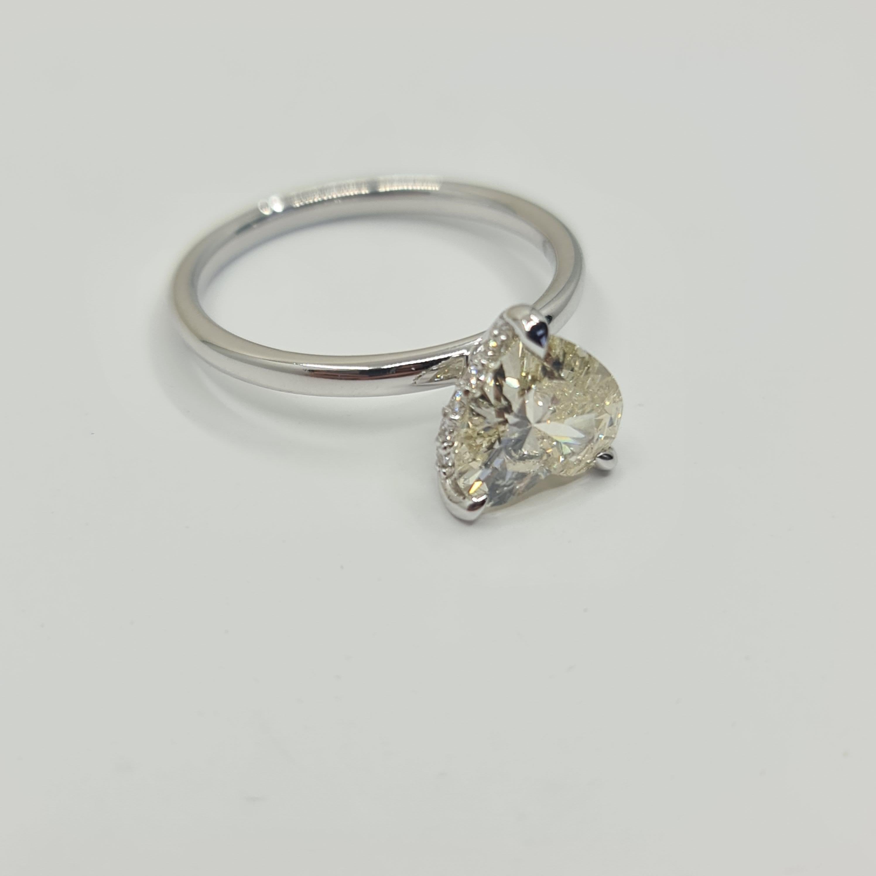 Exquisite GIA Certified 1.60 Carat Heart Diamond Ring with 0.07 Carat Halo G/VS For Sale 8