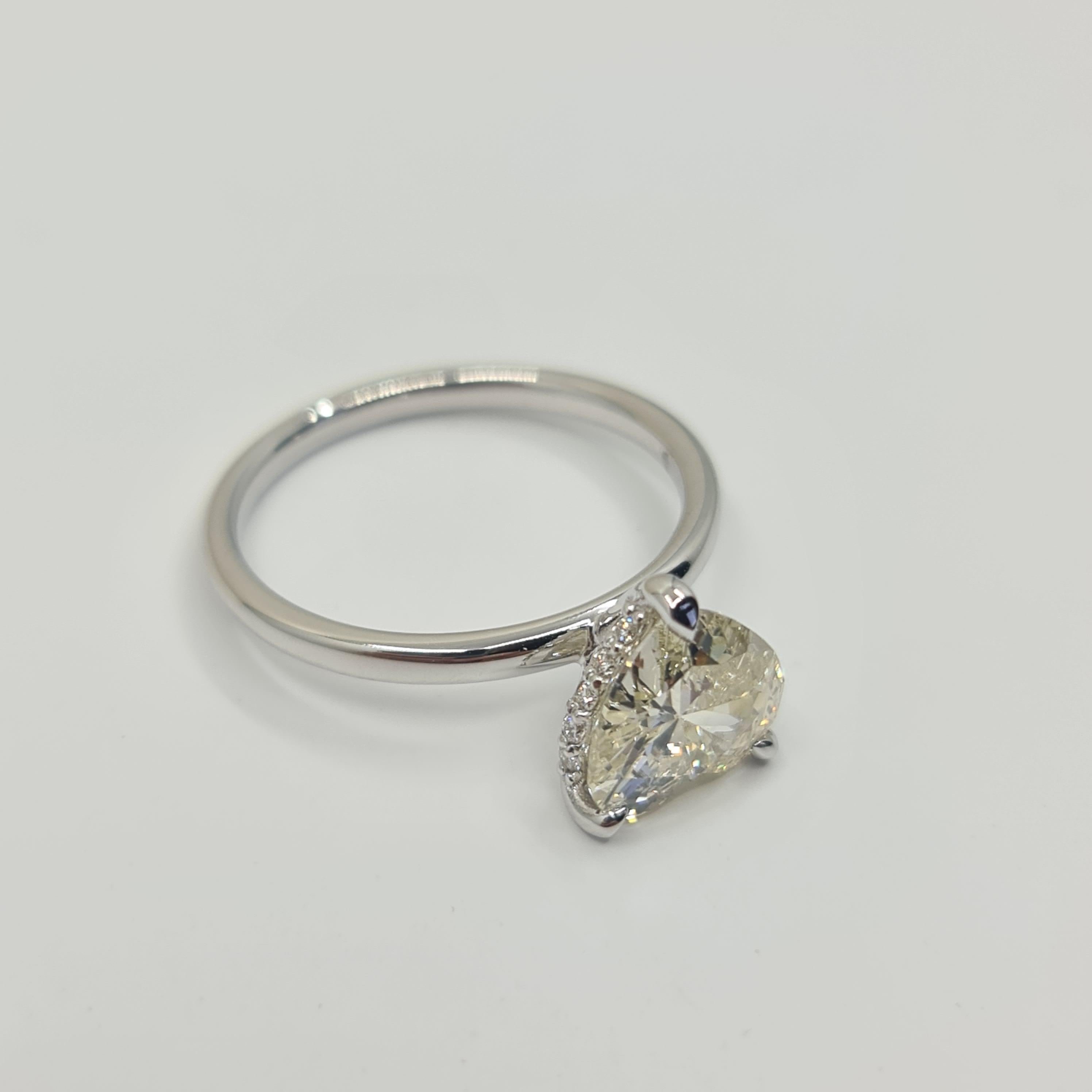 Exquisite GIA Certified 1.60 Carat Heart Diamond Ring with 0.07 Carat Halo G/VS For Sale 12