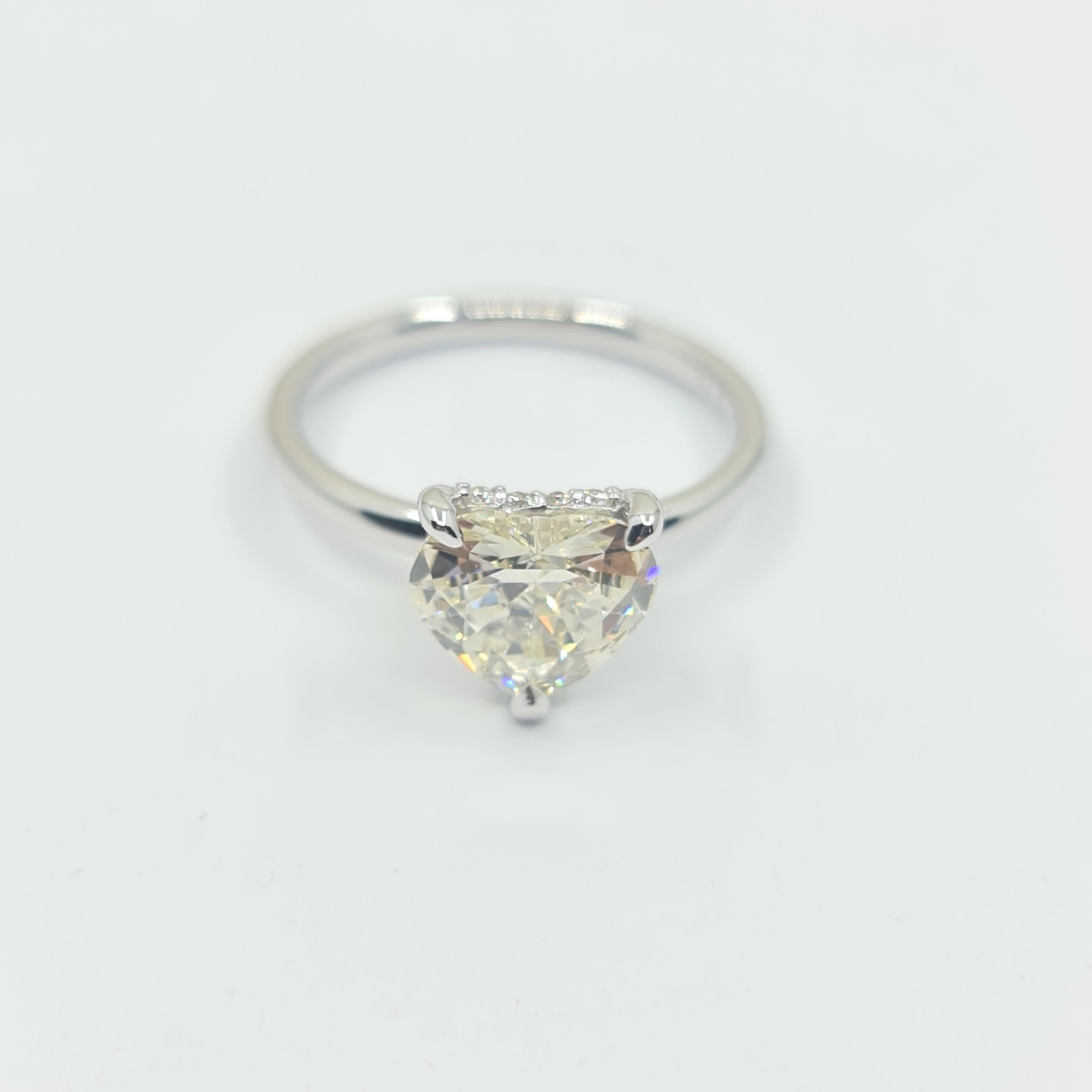 Exquisite GIA Certified 1.60 Carat Heart Diamond Ring with 0.07 Carat Halo G/VS

