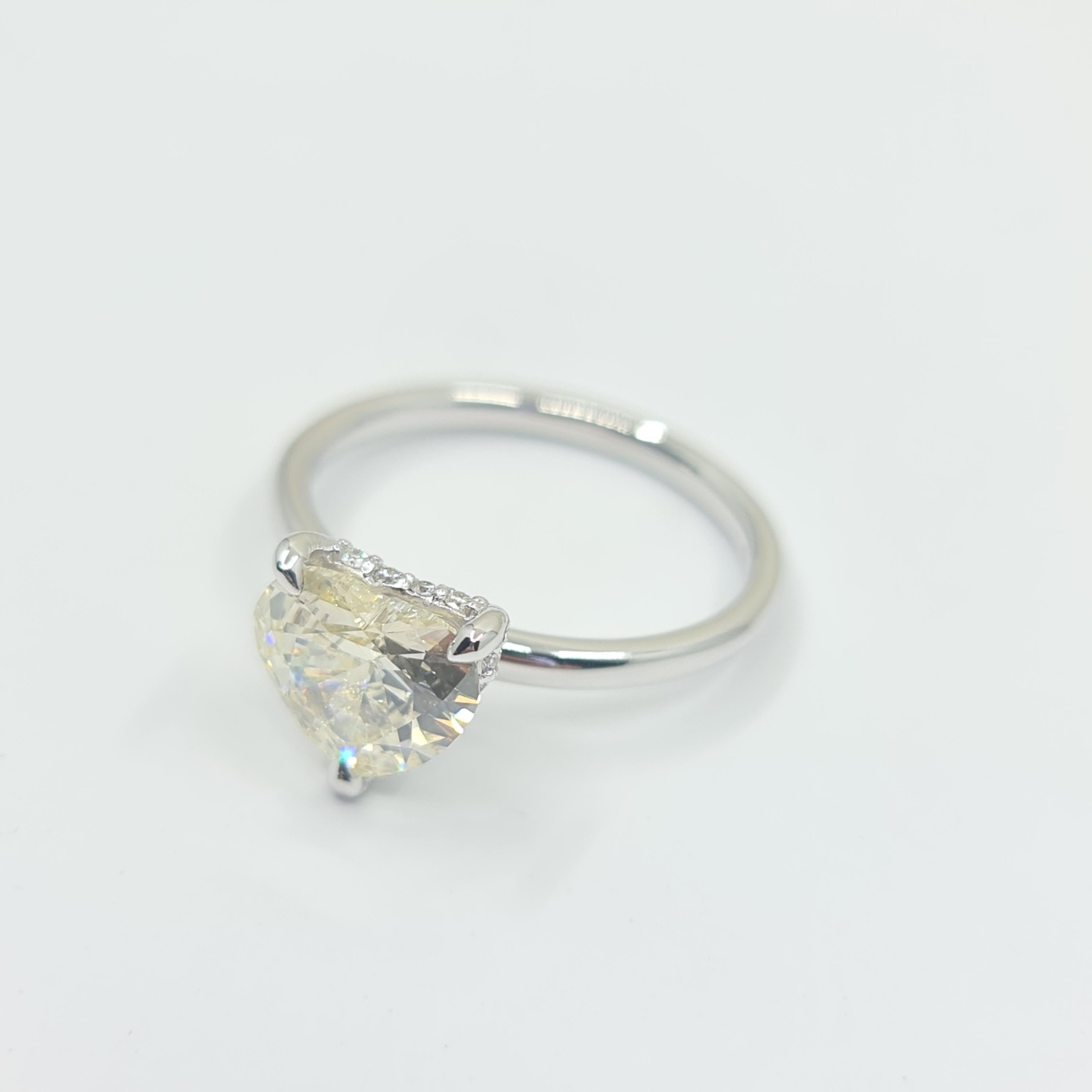 Modern Exquisite GIA Certified 1.60 Carat Heart Diamond Ring with 0.07 Carat Halo G/VS For Sale
