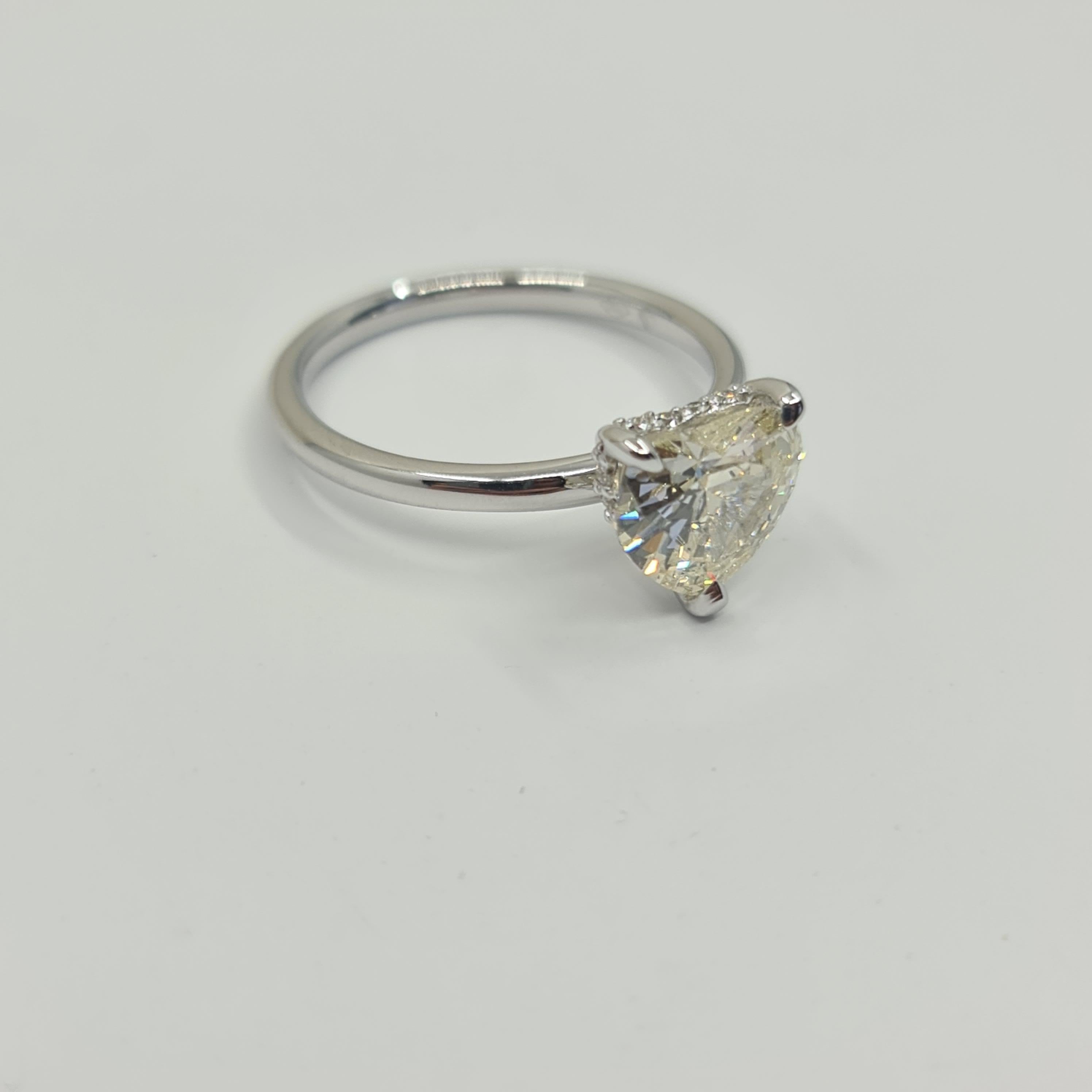 Exquisite GIA Certified 1.60 Carat Heart Diamond Ring with 0.07 Carat Halo G/VS For Sale 2