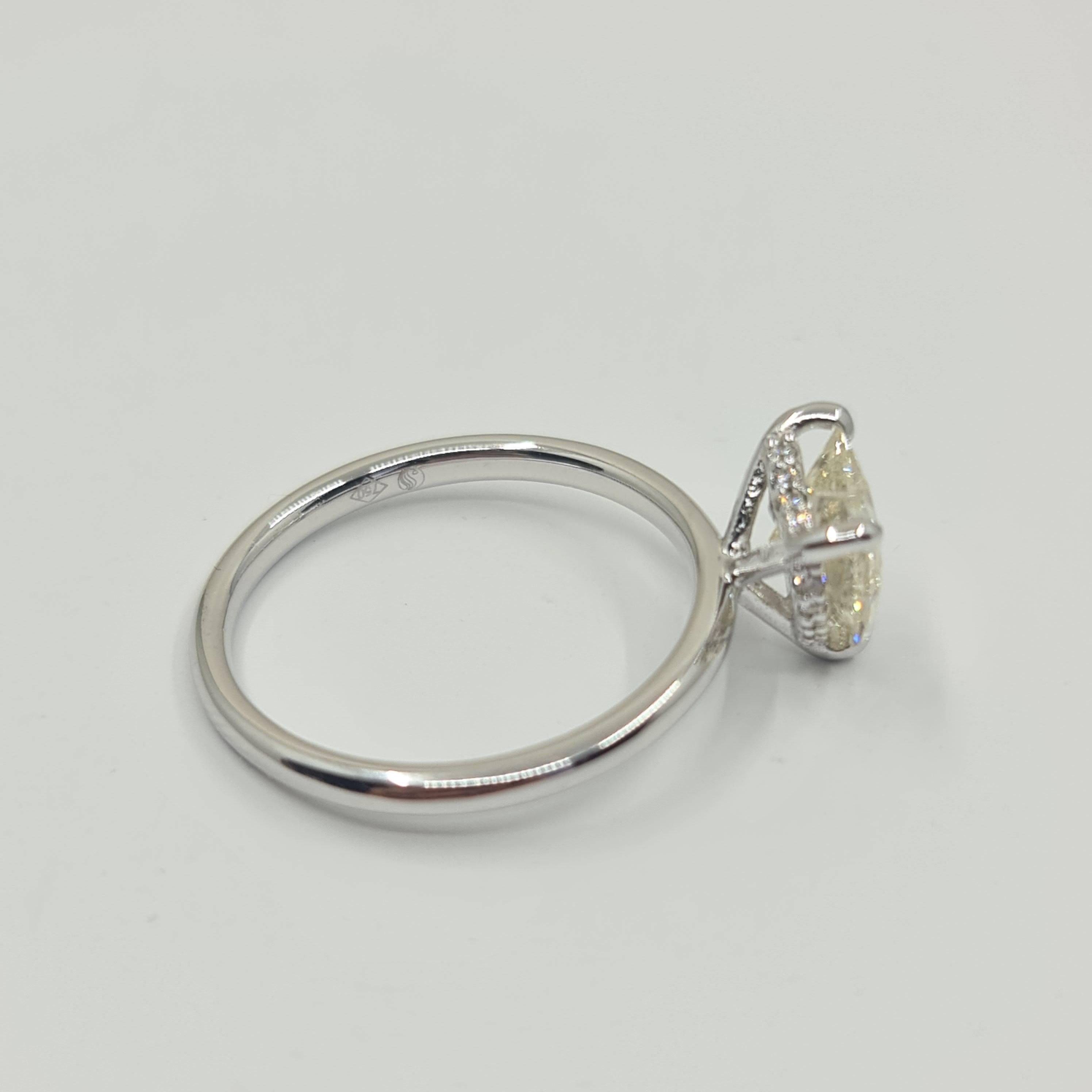 Exquisite GIA Certified 1.60 Carat Heart Diamond Ring with 0.07 Carat Halo G/VS For Sale 3