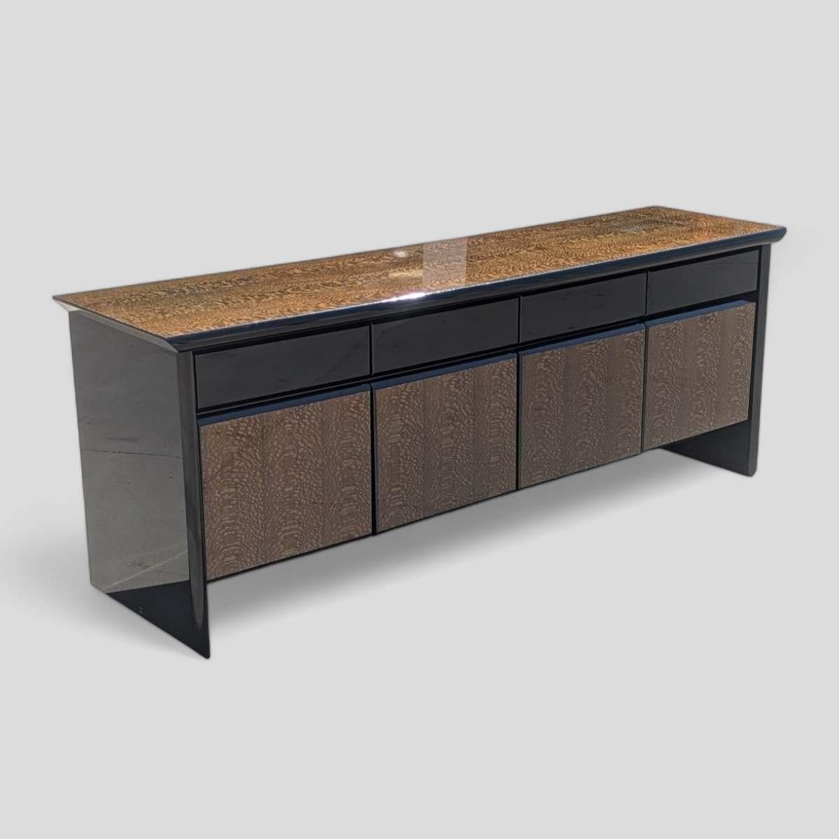 Step into the world of postmodern luxury with this extraordinary sideboard from the esteemed Giorgio Collection. Crafted in Italy, this piece embodies the boldness and experimentation that defined the postmodern design movement.

The sideboard's