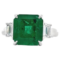 Exquisite Green Emerald and Diamond Halo Engagement Ring in 14k White Gold