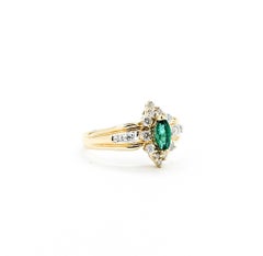 Exquisite Halo Emerald and Diamond Ring in 14k Yellow Gold
